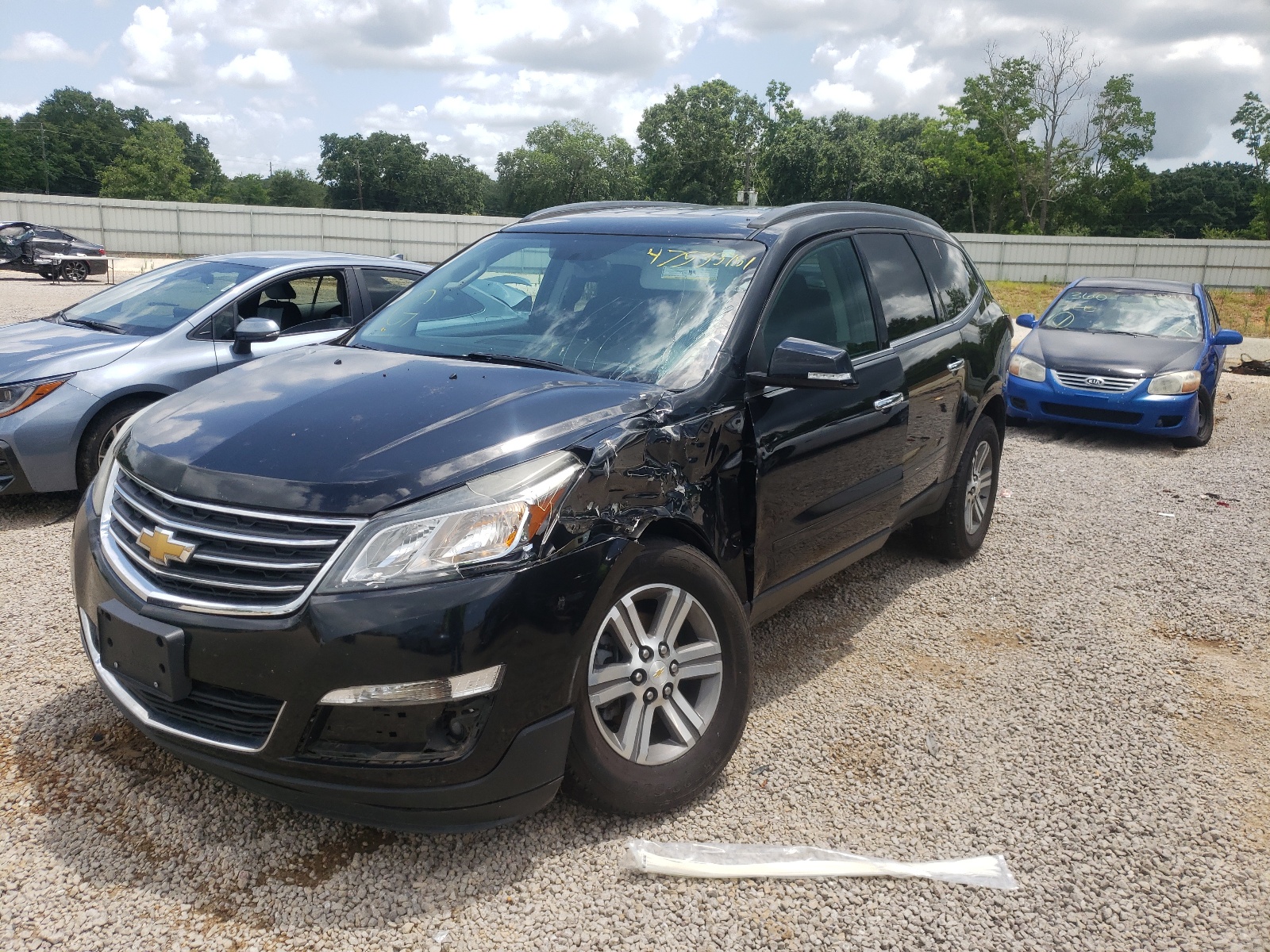 Photo 2 from auction – 2016 CHEVROLET TRAVERSE L with VIN 1GNKRHKD0GJ105355
