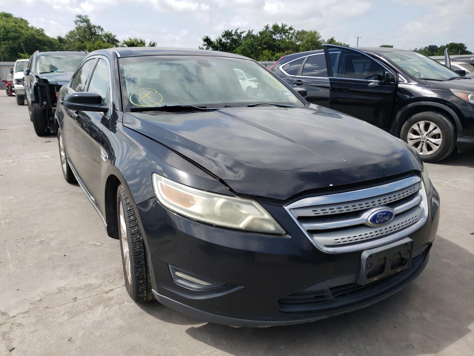 FORD TAURUS SEL 2011 with VIN 1FAHP2HW4BG159915 - Photo from auction
