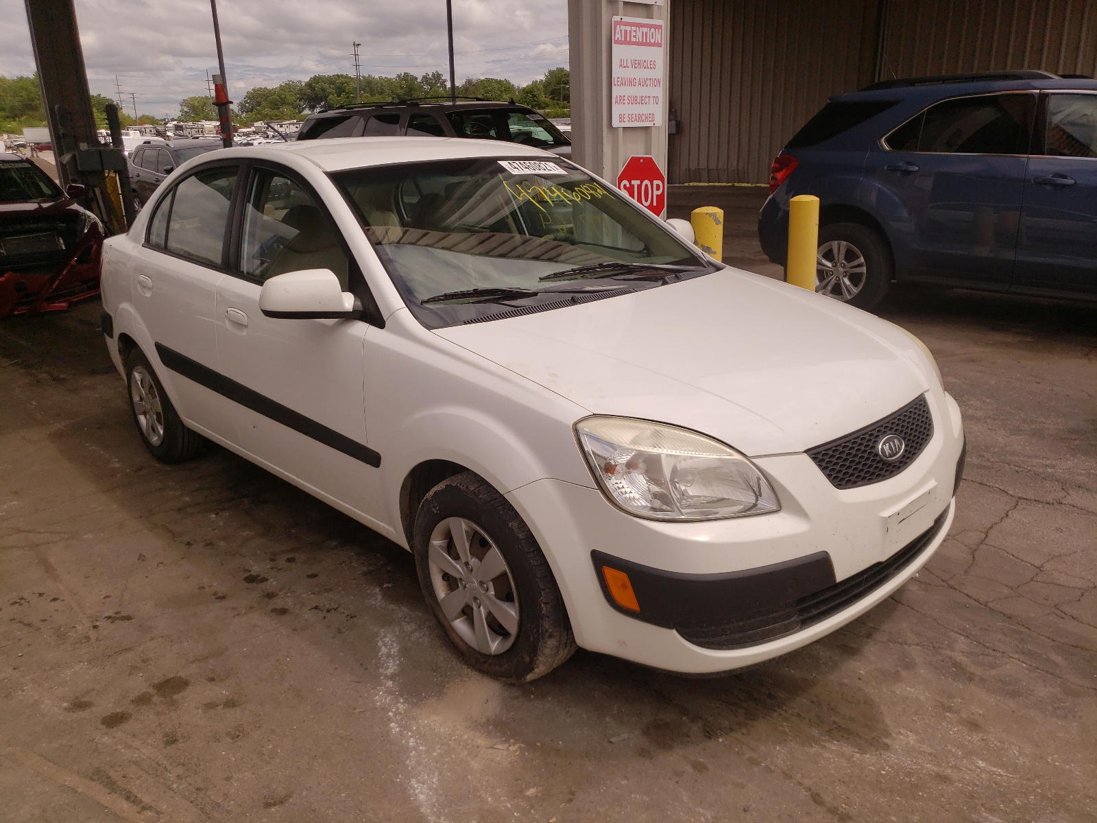 KIA RIO BASE 2009 with VIN KNADE223796504543 - Photo from auction
