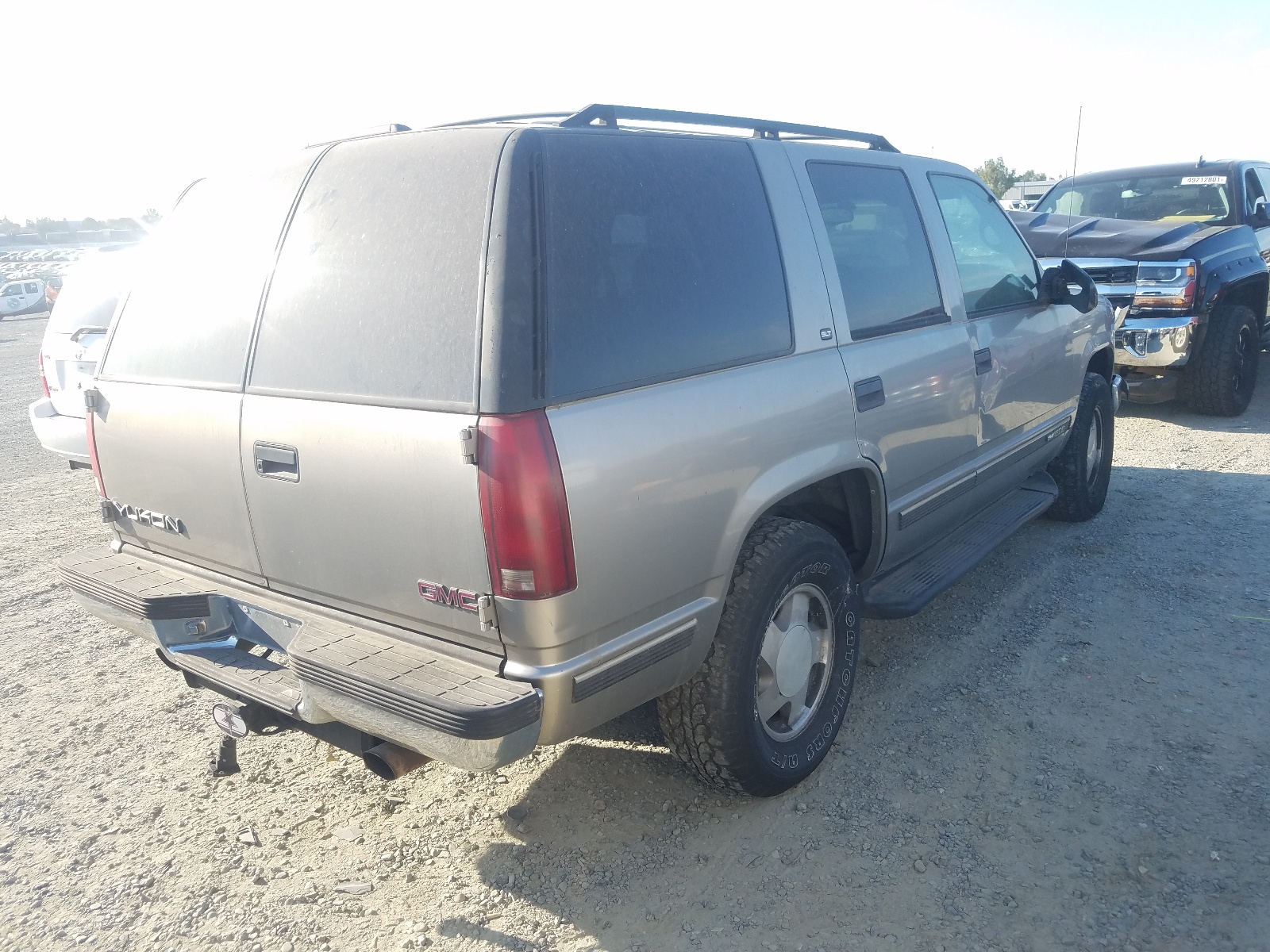 Photo 4 from auction – 1998 GMC YUKON with VIN 1GKEK13R7WJ706499