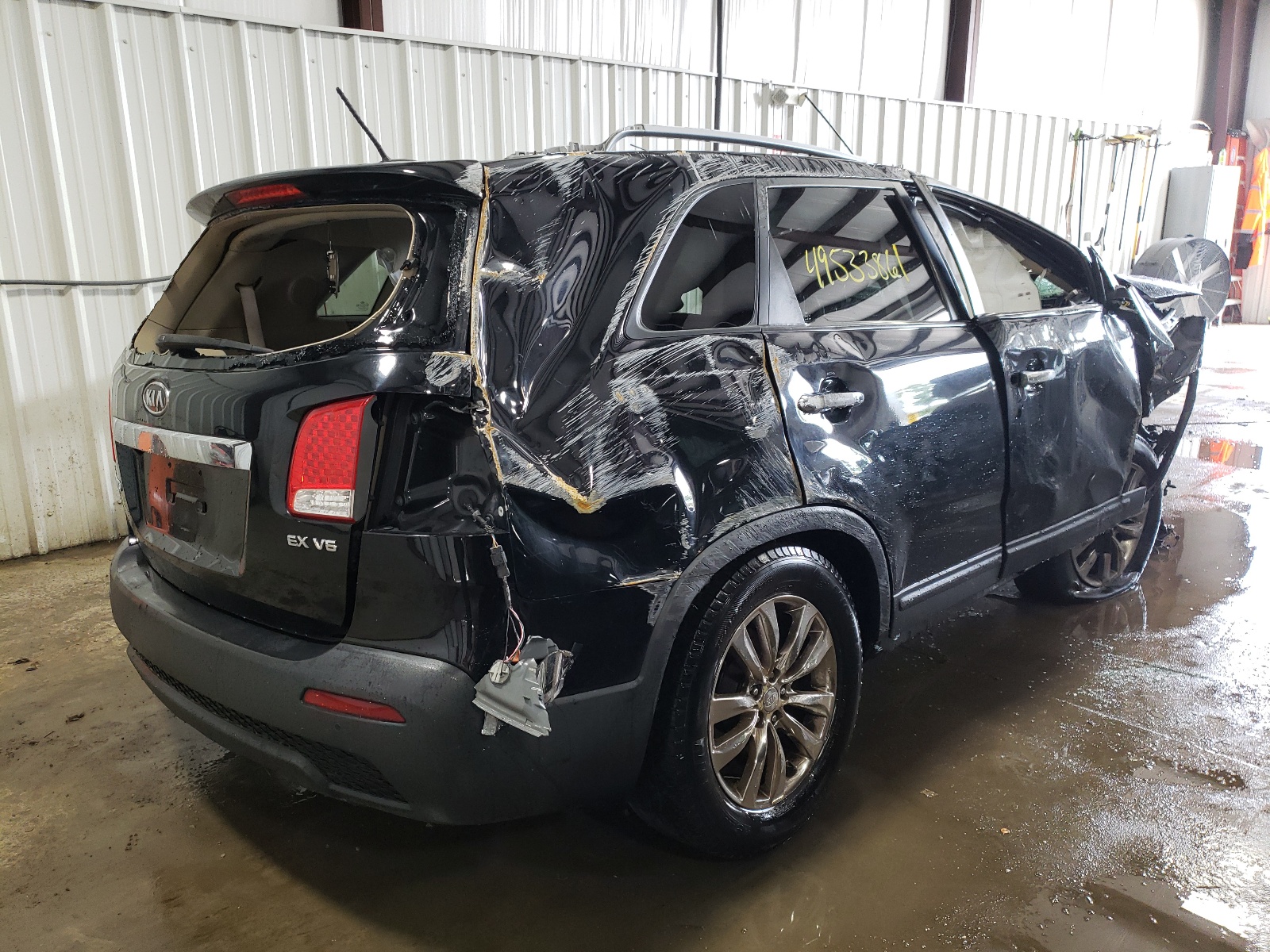 Photo 4 from auction – 2011 KIA SORENTO EX with VIN 5XYKUDA24BG090349