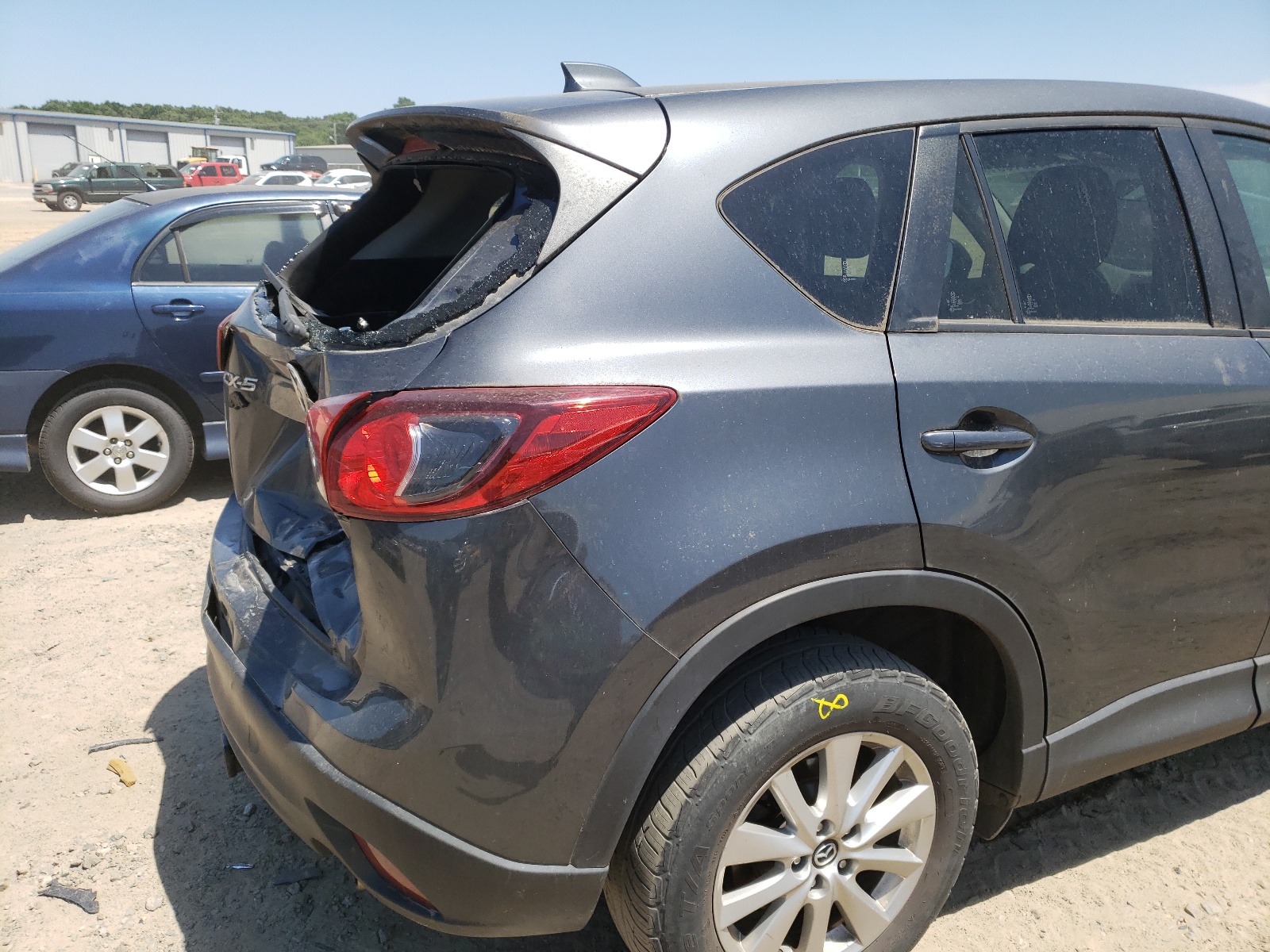 Photo 9 from auction – 2014 MAZDA CX-5 TOURI with VIN JM3KE2CY1E0411252