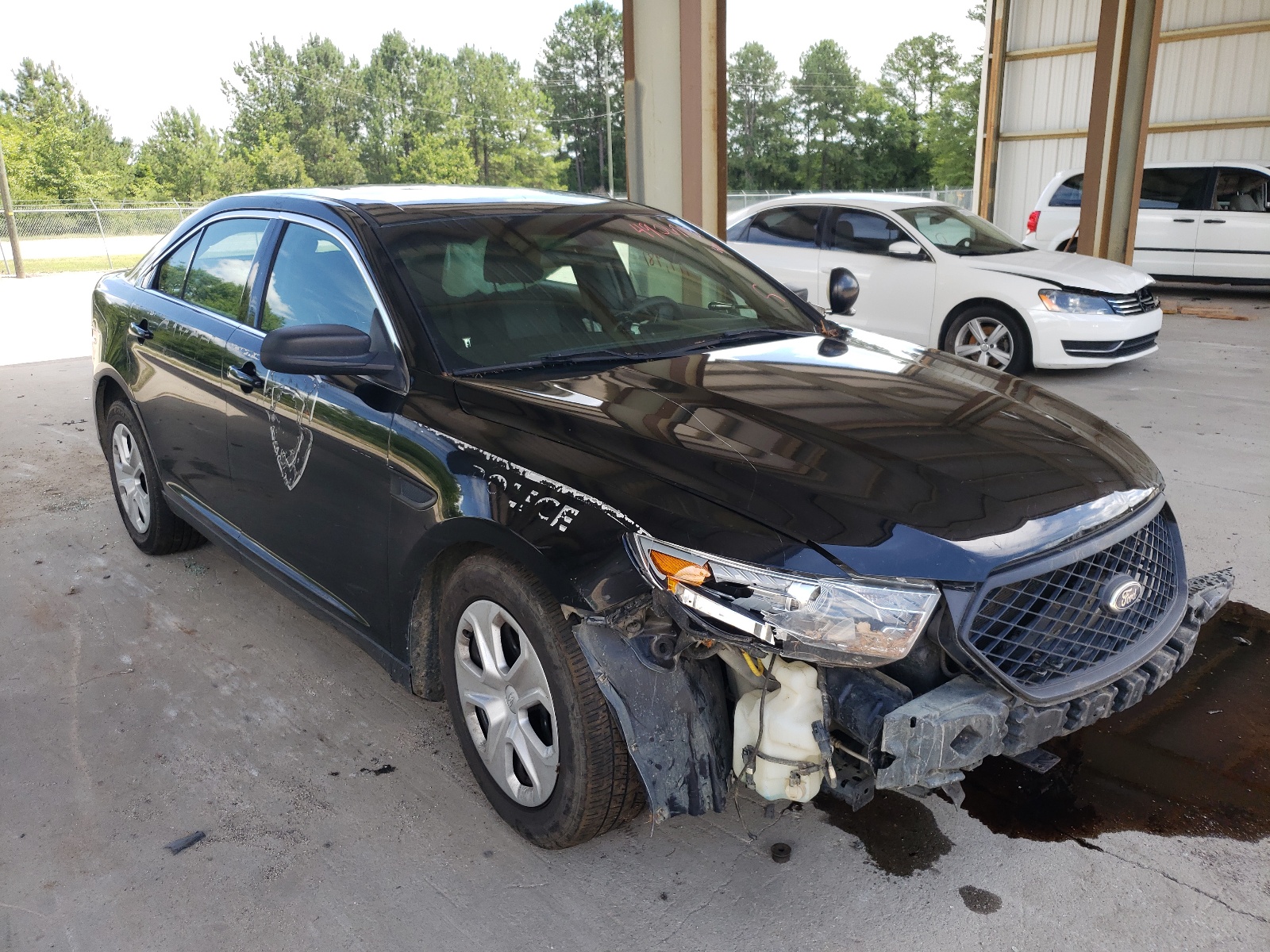 FORD TAURUS POL 2013 con VIN 1FAHP2M88DG110534 - Foto de la subasta