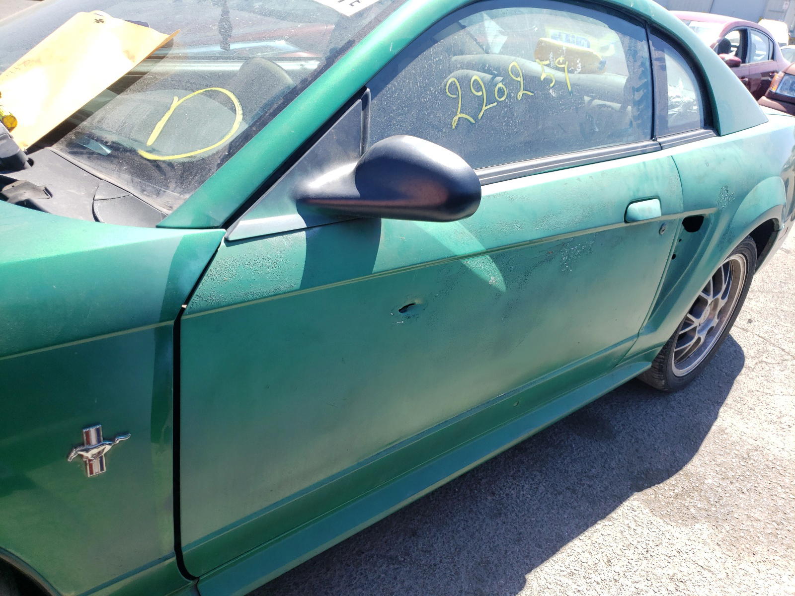 Photo 10 from auction – 2000 FORD MUSTANG with VIN 1FAFP4044YF184227