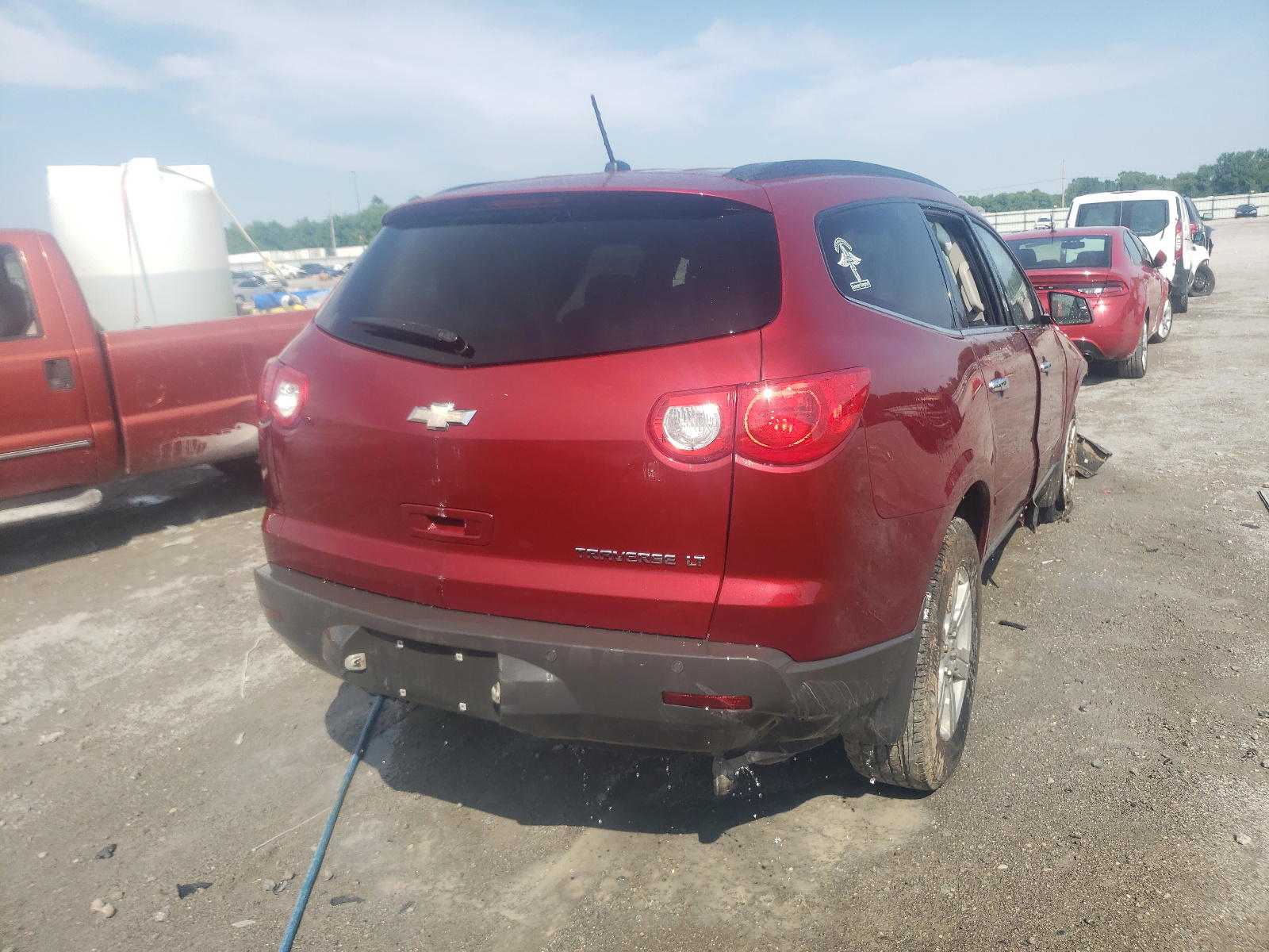 Photo 4 from auction – 2010 CHEVROLET TRAVERSE L with VIN 1GNLRFED5AJ197722