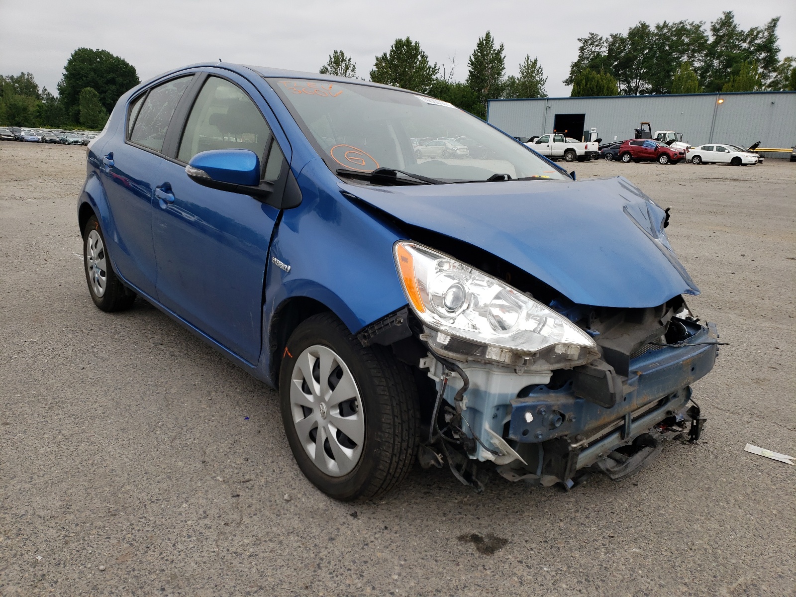 Photo 1 from auction – 2014 TOYOTA PRIUS C with VIN JTDKDTB35E1574035