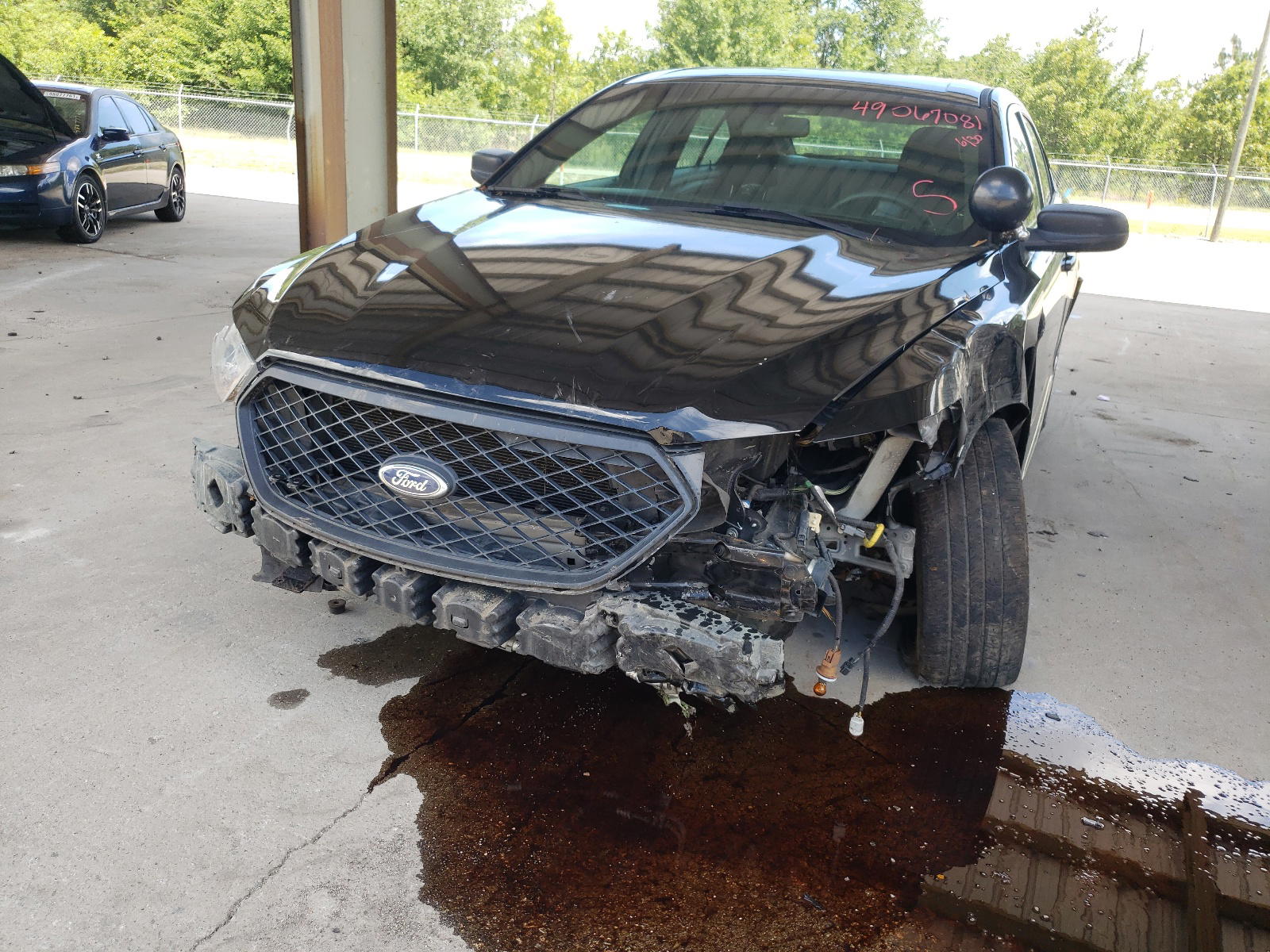 Photo 9 from auction – 2013 FORD TAURUS POL with VIN 1FAHP2M88DG110534