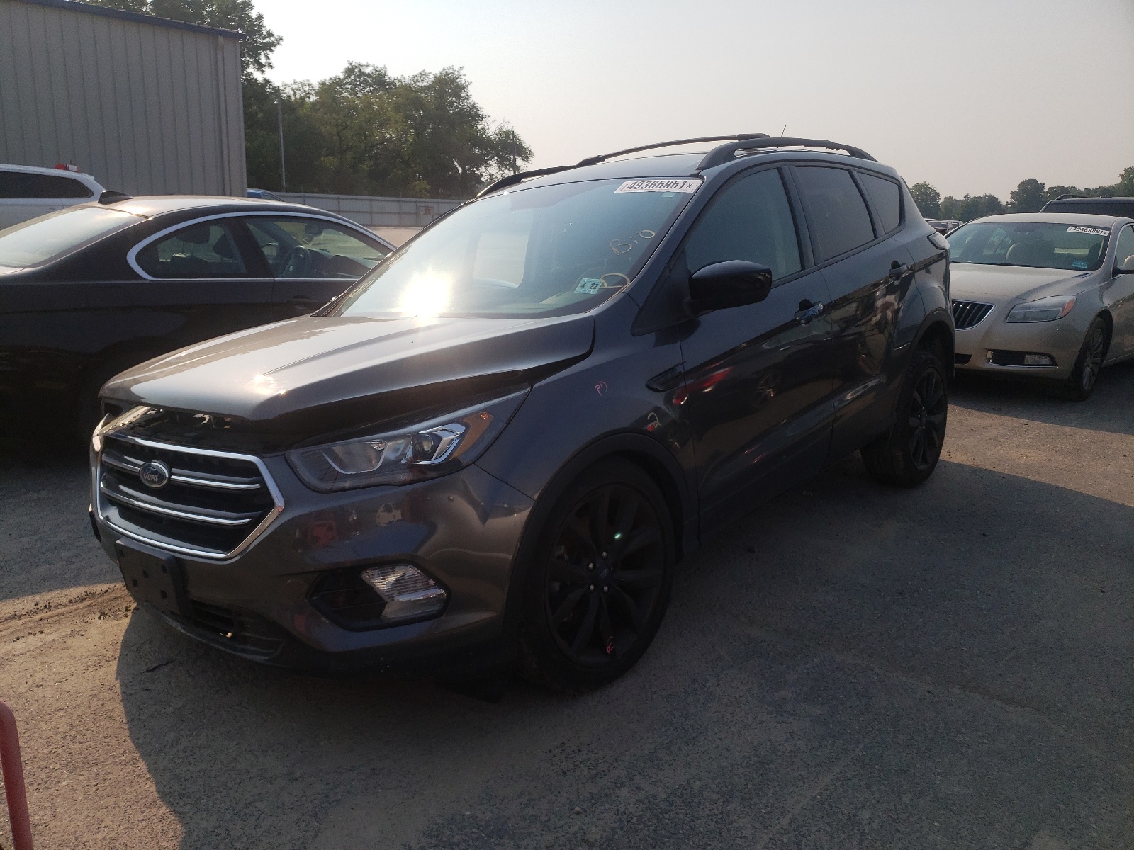 Photo 2 from auction – 2017 FORD ESCAPE SE with VIN 1FMCU9G95HUC83814