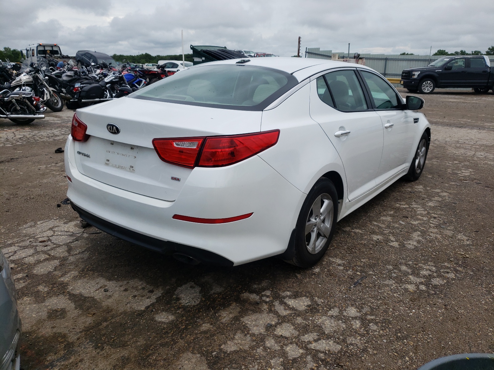 Photo 4 from auction – 2014 KIA OPTIMA LX with VIN 5XXGM4A79EG334720