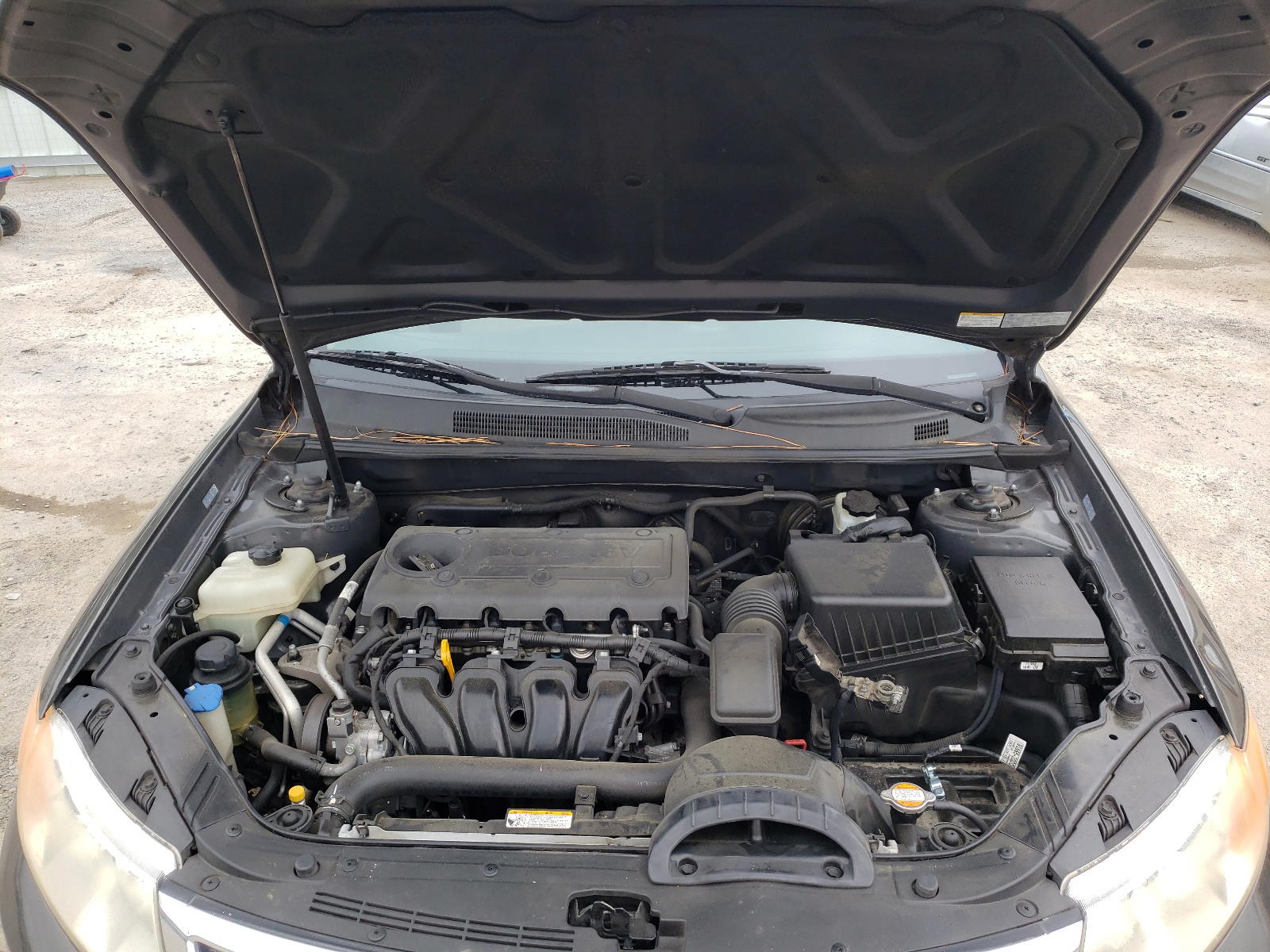Photo 7 from auction – 2010 KIA OPTIMA LX with VIN KNAGG4A81A5377489