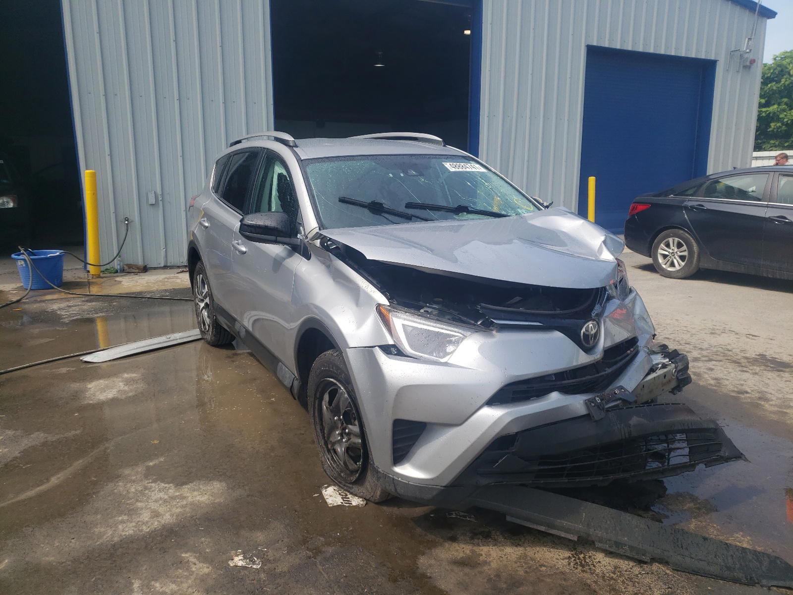 TOYOTA RAV4 LE 2017 with VIN 2T3BFREV9HW647634 - Photo from auction