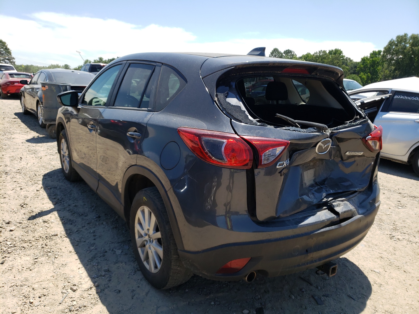 Photo 3 from auction – 2014 MAZDA CX-5 TOURI with VIN JM3KE2CY1E0411252