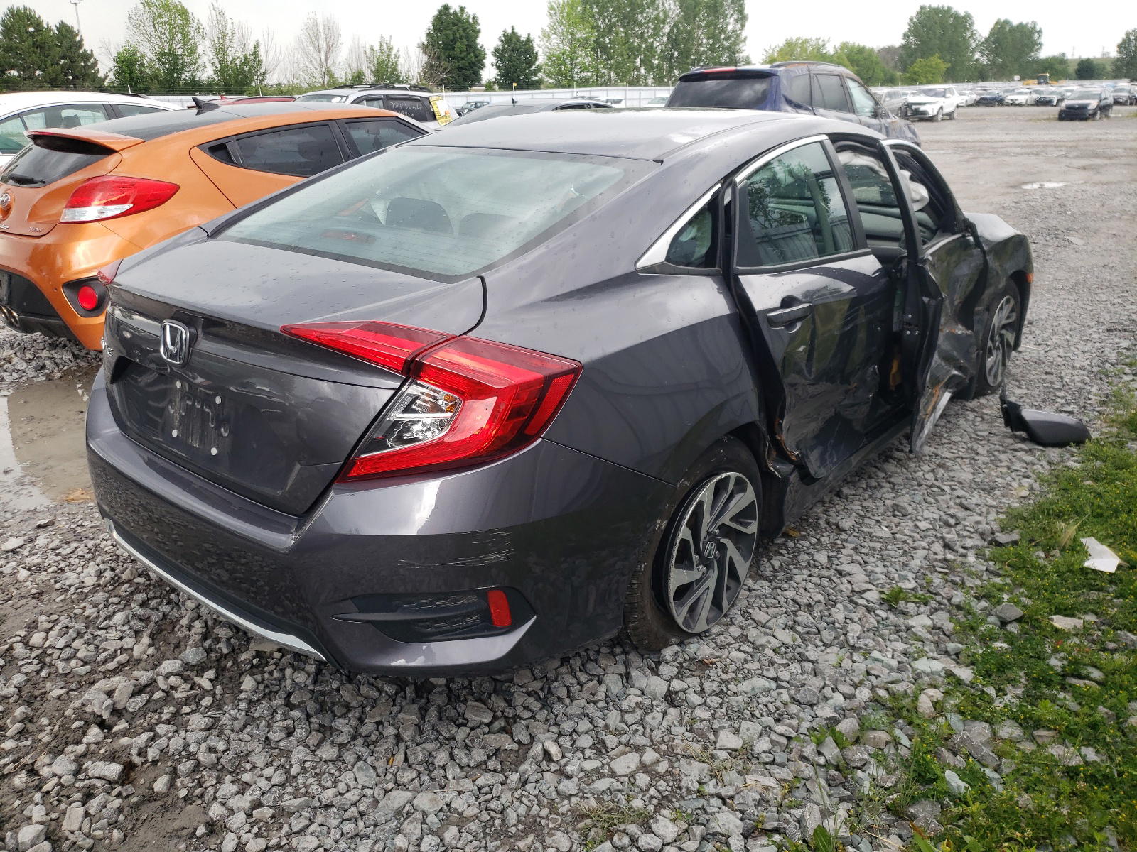 Photo 4 from auction – 2019 HONDA CIVIC EX with VIN 2HGFC2F71KH005354