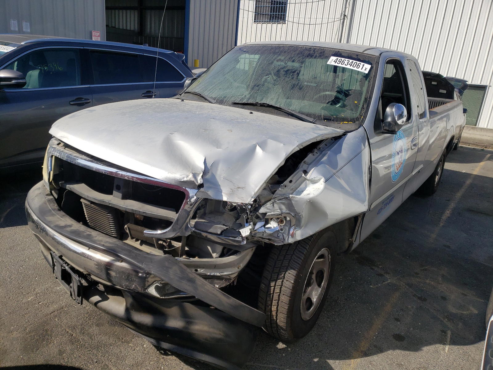 Photo 2 from auction – 2002 FORD F150 with VIN 1FTRX17L32NB65054