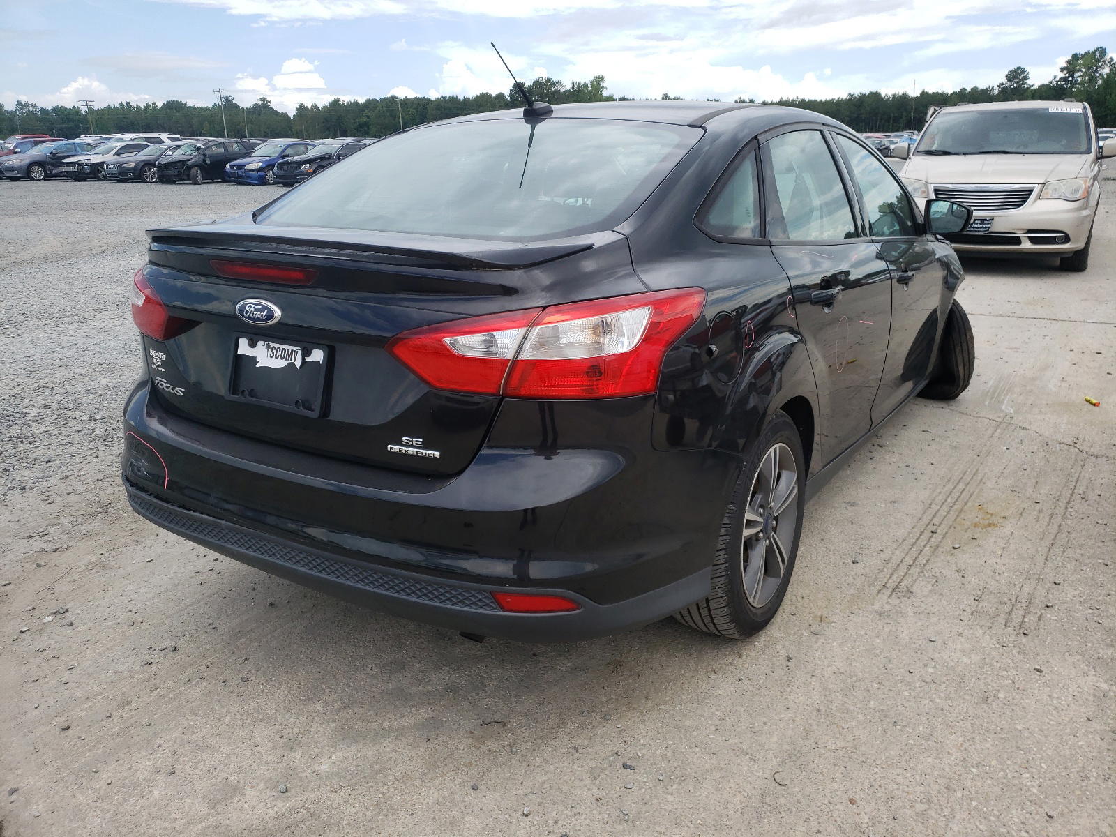 Photo 4 from auction – 2014 FORD FOCUS SE with VIN 1FADP3F25EL353384
