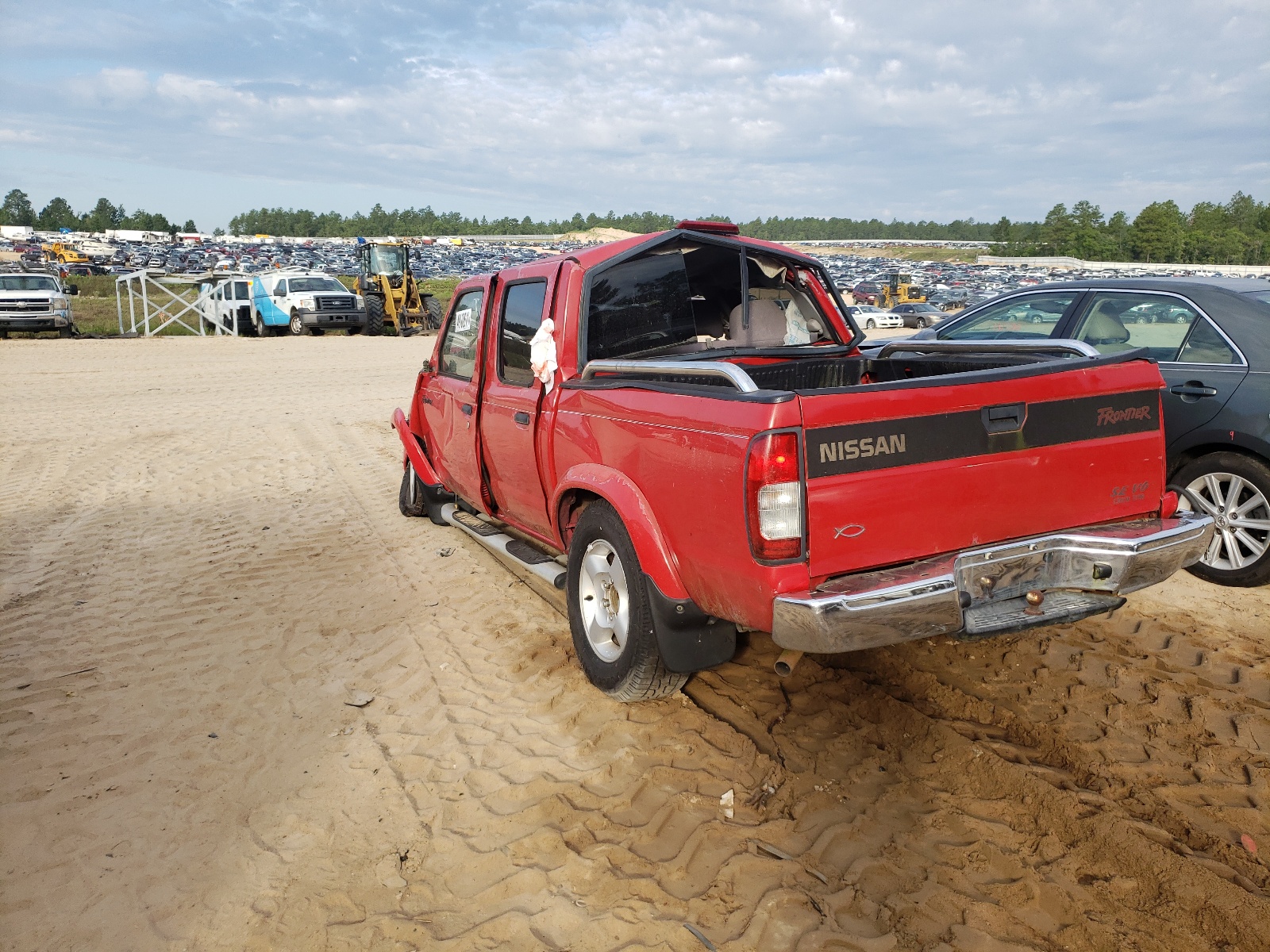 Photo 3 from auction – 2000 NISSAN FRONTIER C with VIN 1N6ED27T8YC326156