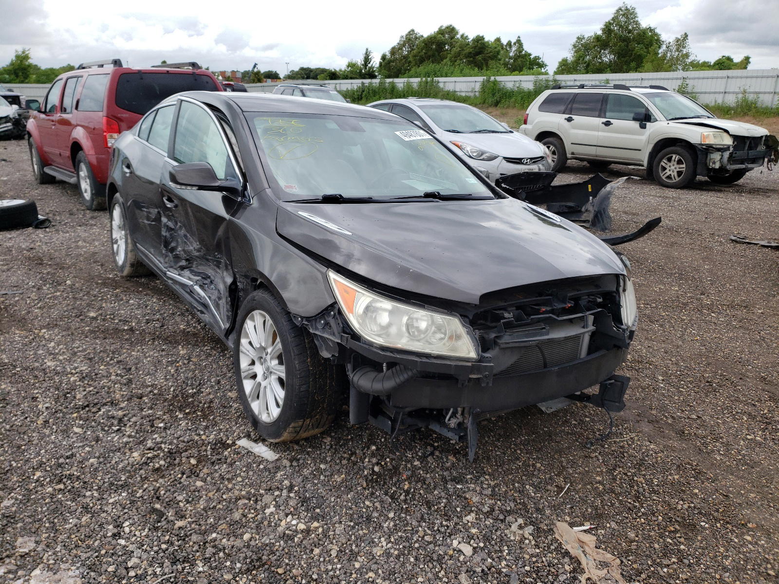 BUICK LACROSSE 2013 with VIN 1G4GC5E39DF239941 - Photo from auction