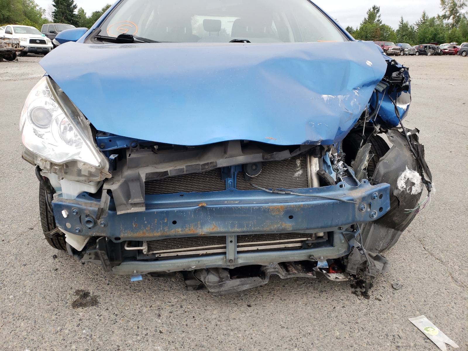 Photo 9 from auction – 2014 TOYOTA PRIUS C with VIN JTDKDTB35E1574035