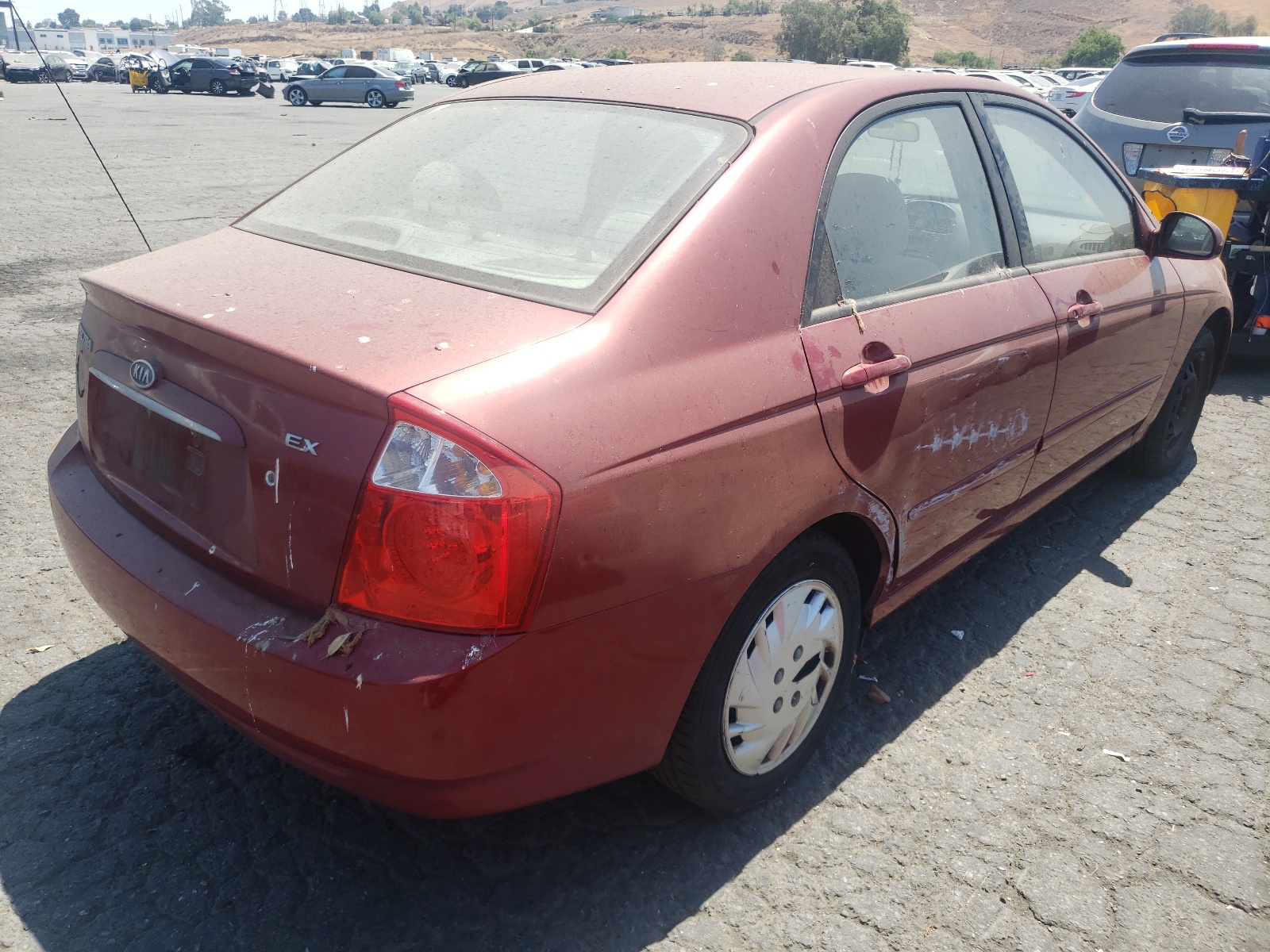 Photo 4 from auction – 2005 KIA SPECTRA LX with VIN KNAFE121855197451