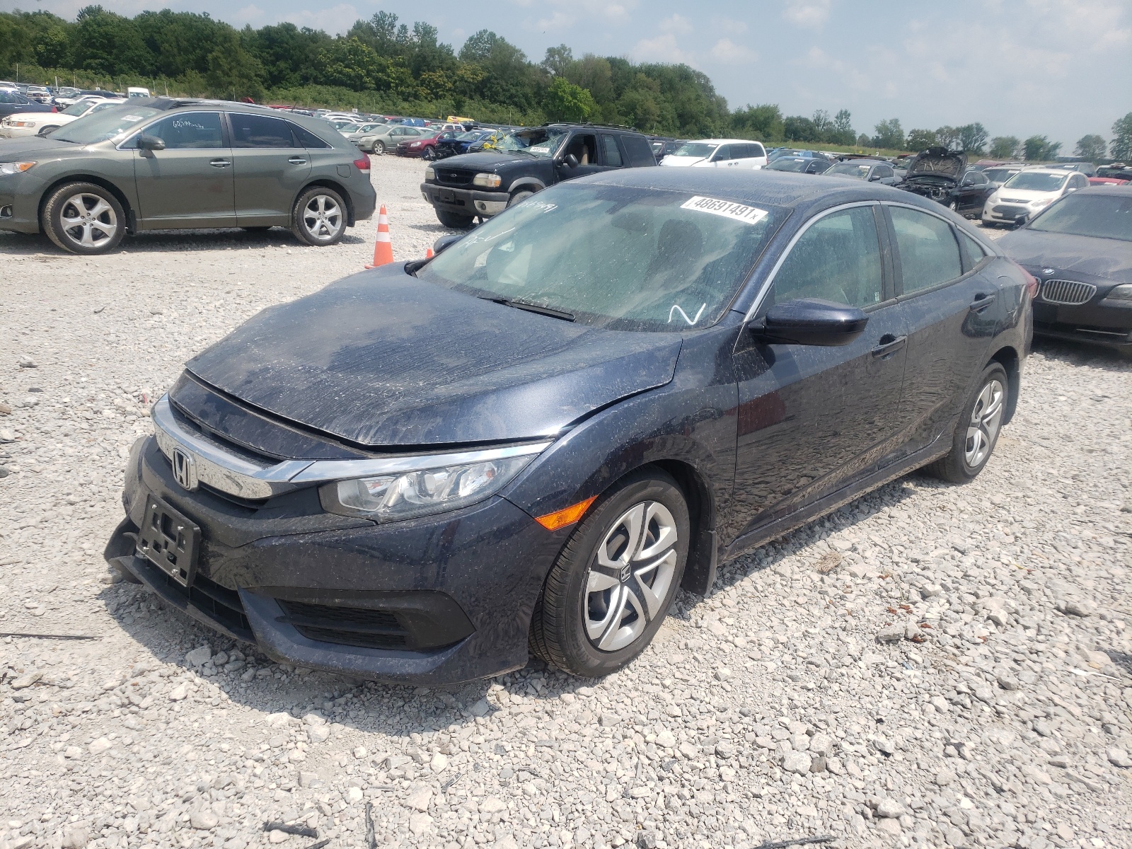 Photo 2 from auction – 2018 HONDA CIVIC LX with VIN 19XFC2F58JE007383