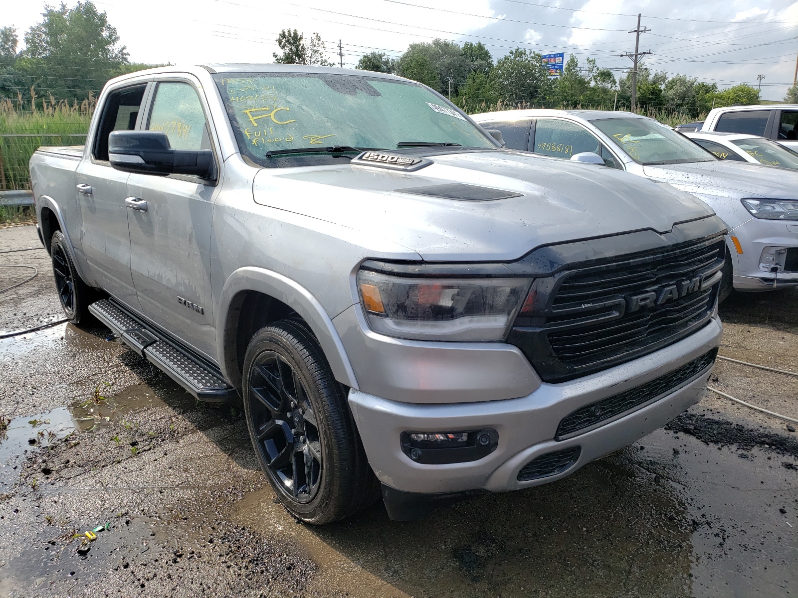 RAM 1500 LARAM 2021 with VIN 1C6SRFJT4MN585627 - Photo from auction