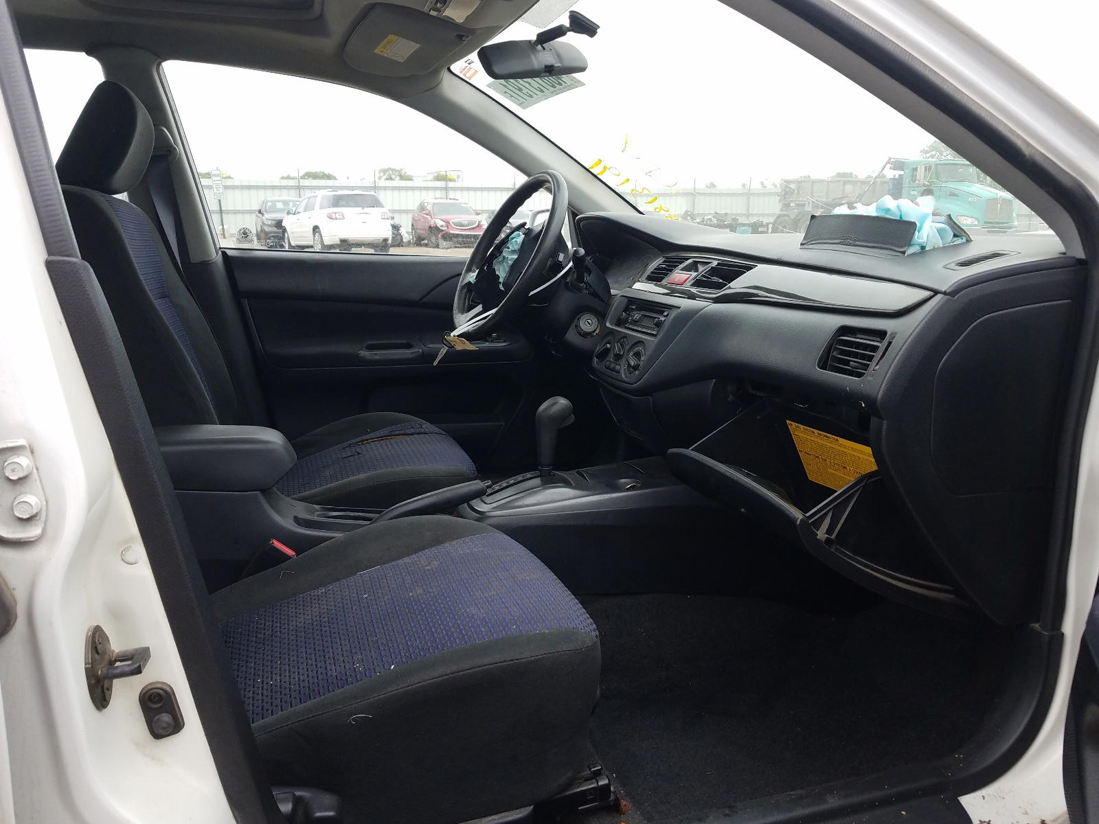 Photo 5 from auction – 2003 MITSUBISHI LANCER LS with VIN JA3AJ36E43U094966