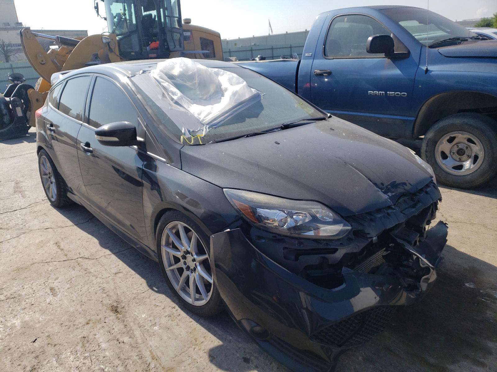 FORD FOCUS ST 2014 with VIN 1FADP3L90EL229542 - Photo from auction