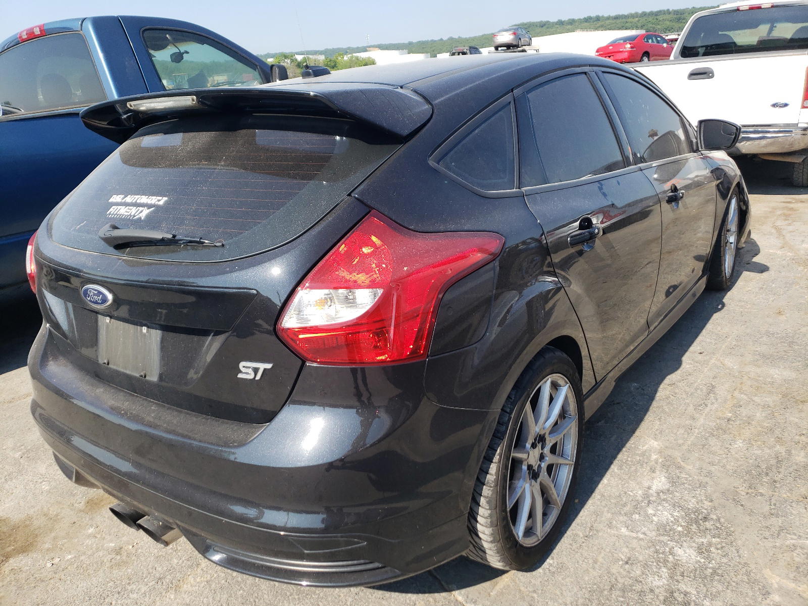 Photo 4 from auction – 2014 FORD FOCUS ST with VIN 1FADP3L90EL229542