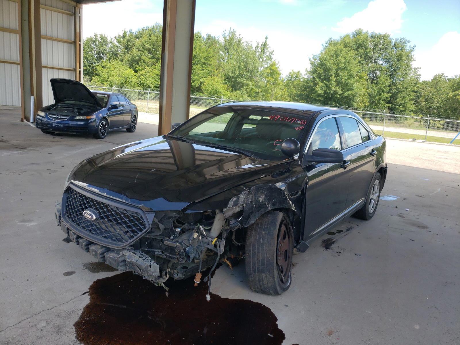 Photo 2 from auction – 2013 FORD TAURUS POL with VIN 1FAHP2M88DG110534