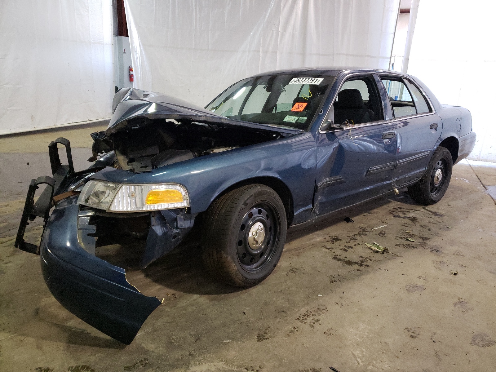 Photo 2 from auction – 2009 FORD CROWN VICT with VIN 2FAHP71V19X102056