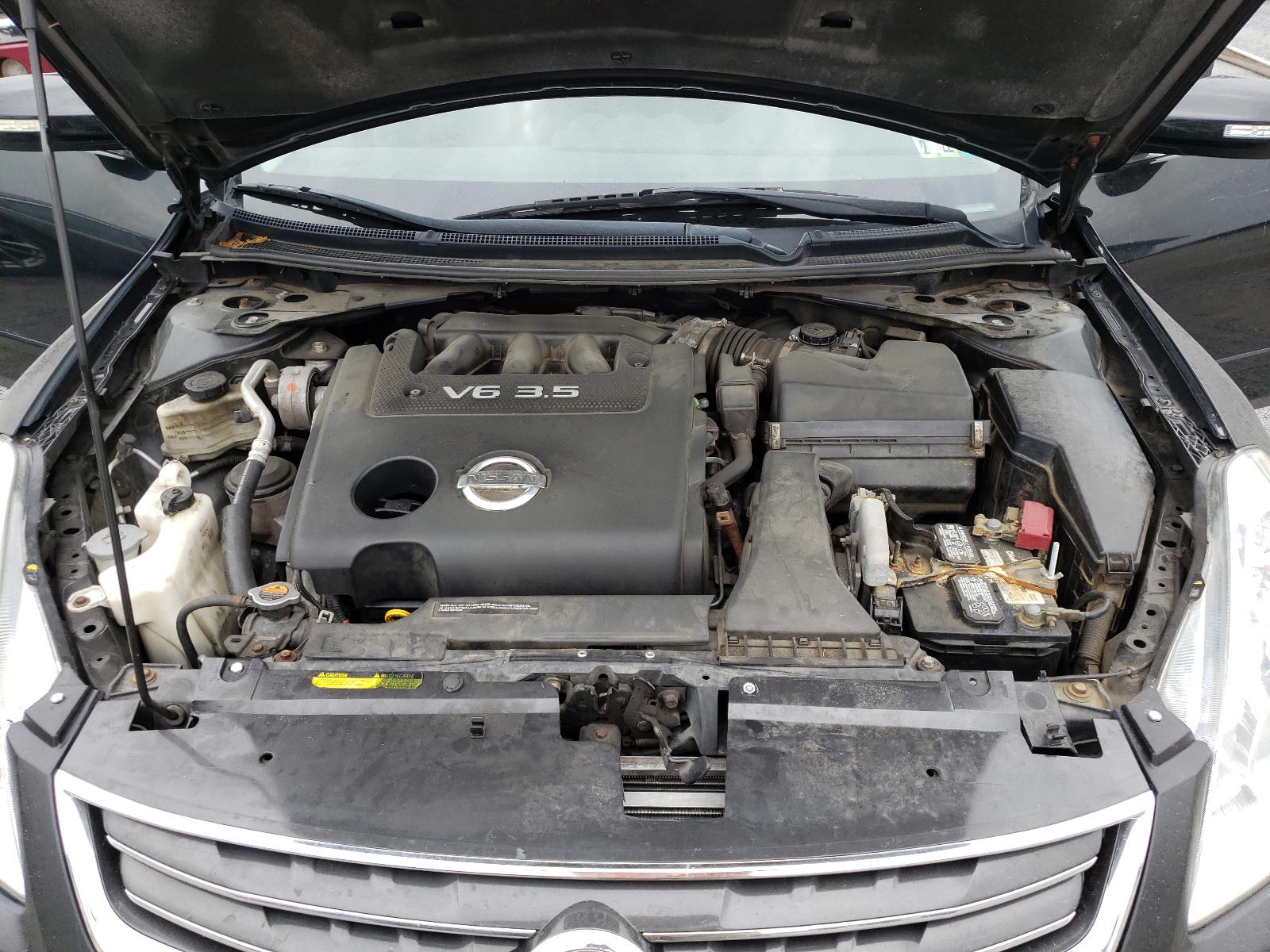Photo 7 from auction – 2010 NISSAN ALTIMA SR with VIN 1N4BL2AP1AC112884