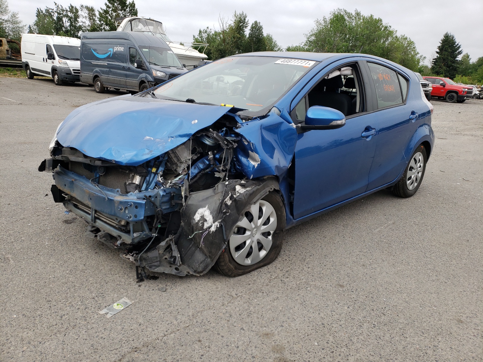 Photo 2 from auction – 2014 TOYOTA PRIUS C with VIN JTDKDTB35E1574035