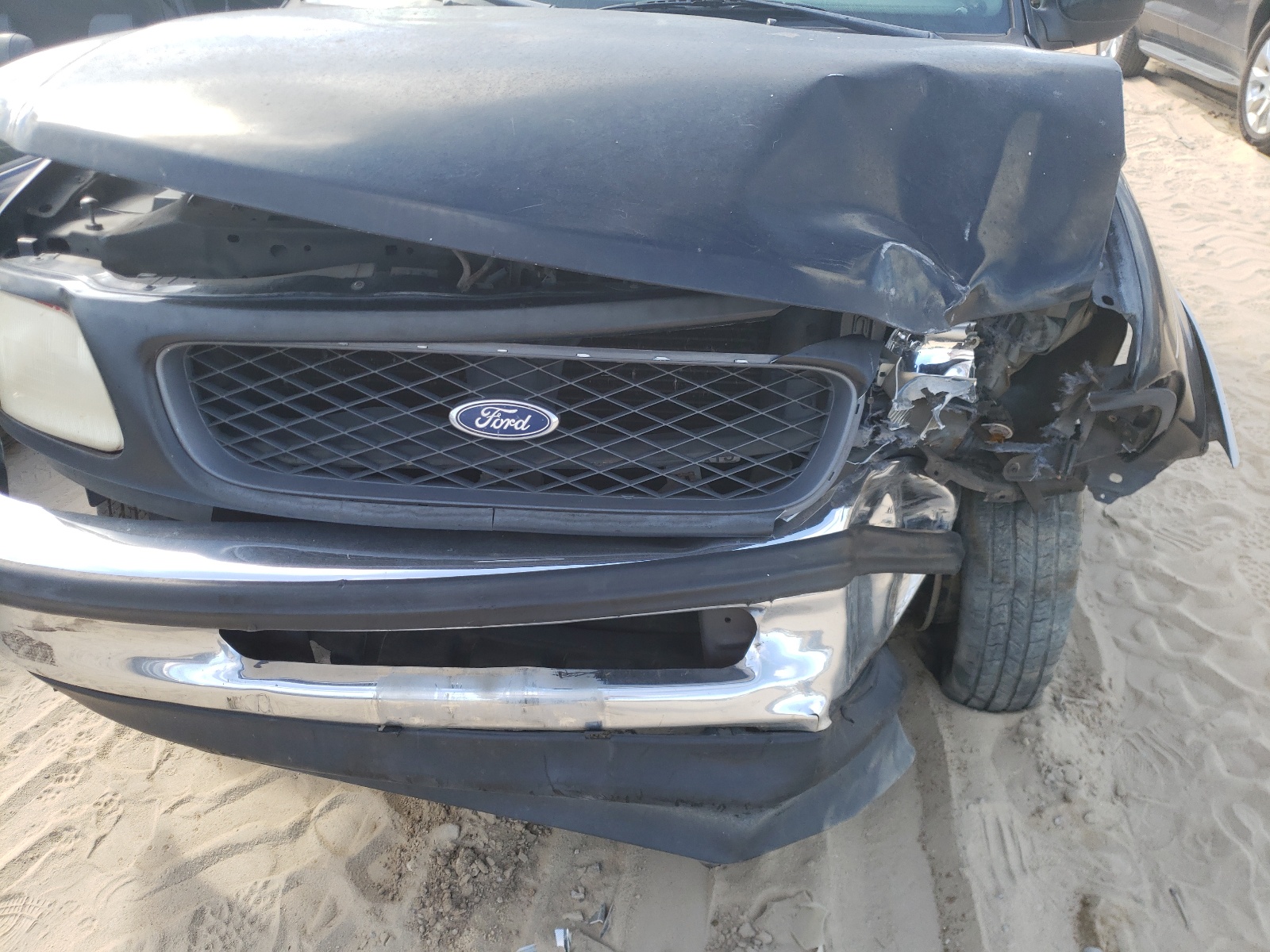Photo 9 from auction – 1998 FORD F150 with VIN 1FTZX0763WKA34573