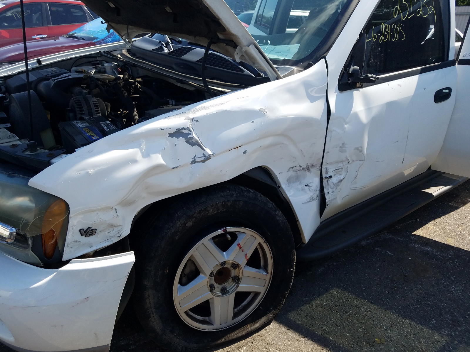 Photo 10 from auction – 2003 CHEVROLET TRAILBLAZE with VIN 1GNES16P536234315