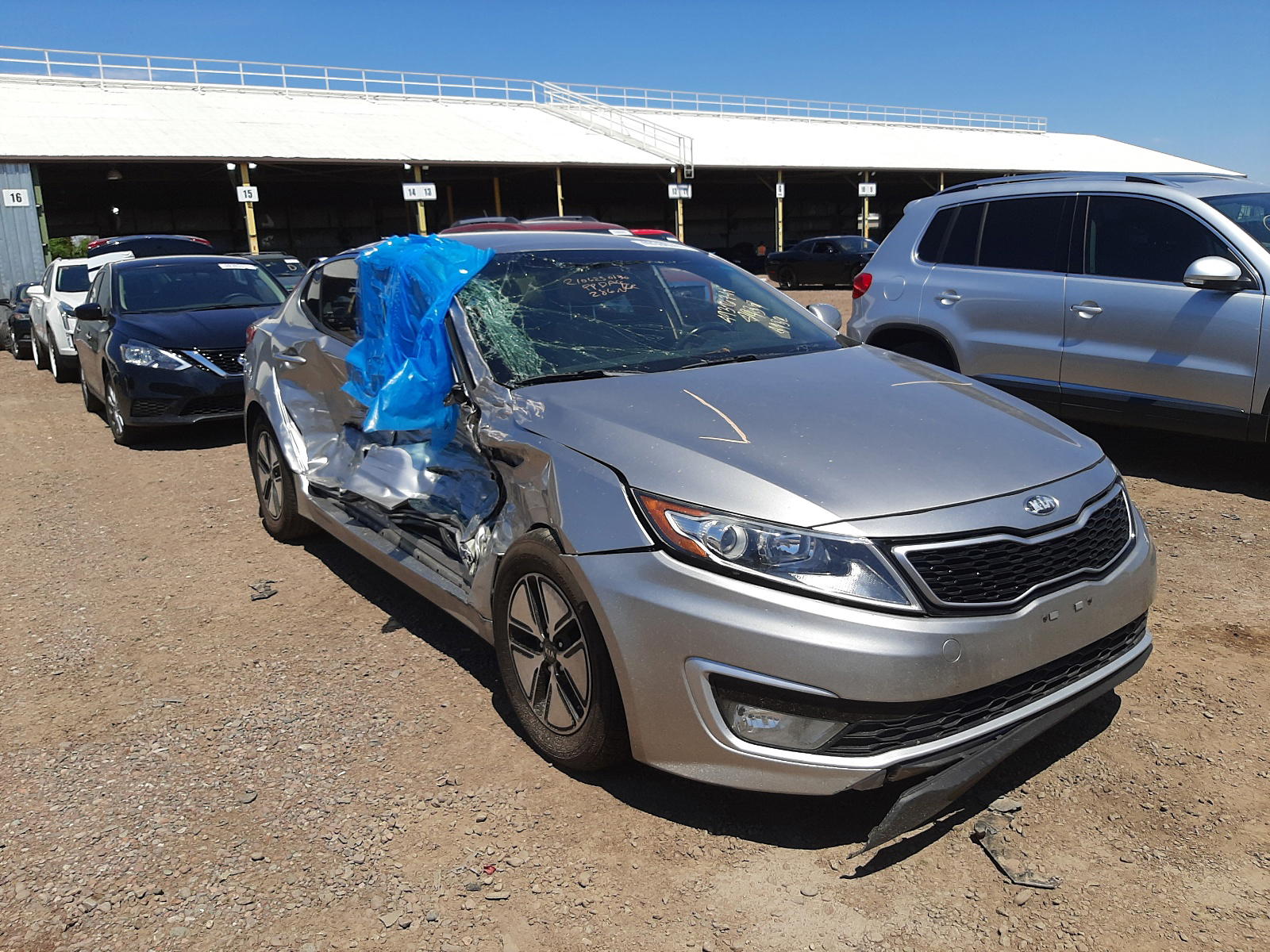 KIA OPTIMA HYB 2012 with VIN KNAGM4AD2C5021724 - Photo from auction
