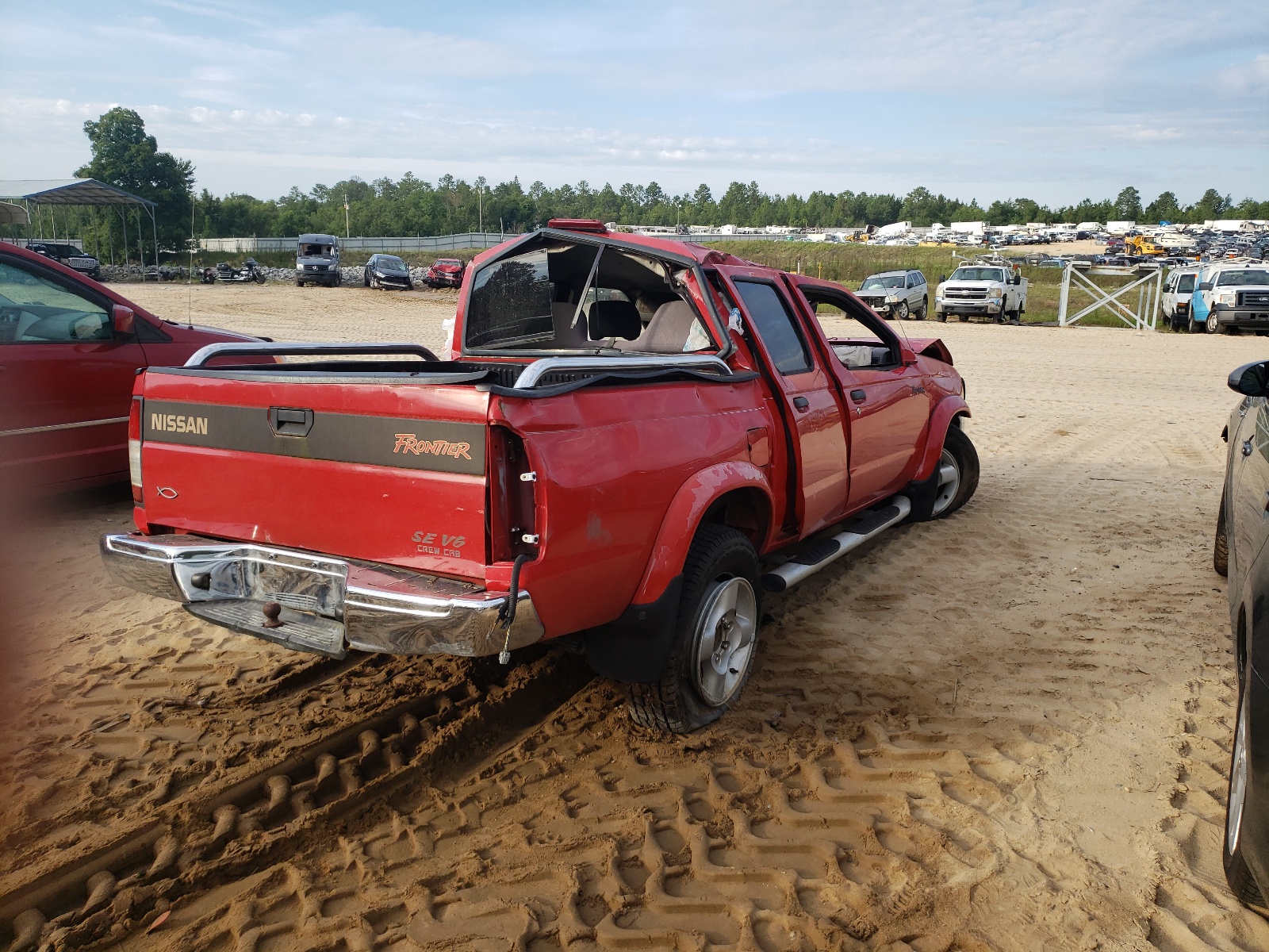 Photo 4 from auction – 2000 NISSAN FRONTIER C with VIN 1N6ED27T8YC326156