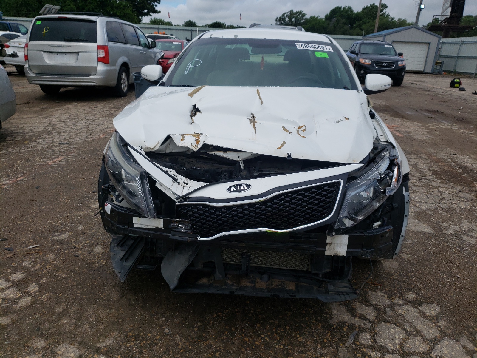 Photo 9 from auction – 2014 KIA OPTIMA LX with VIN 5XXGM4A79EG334720
