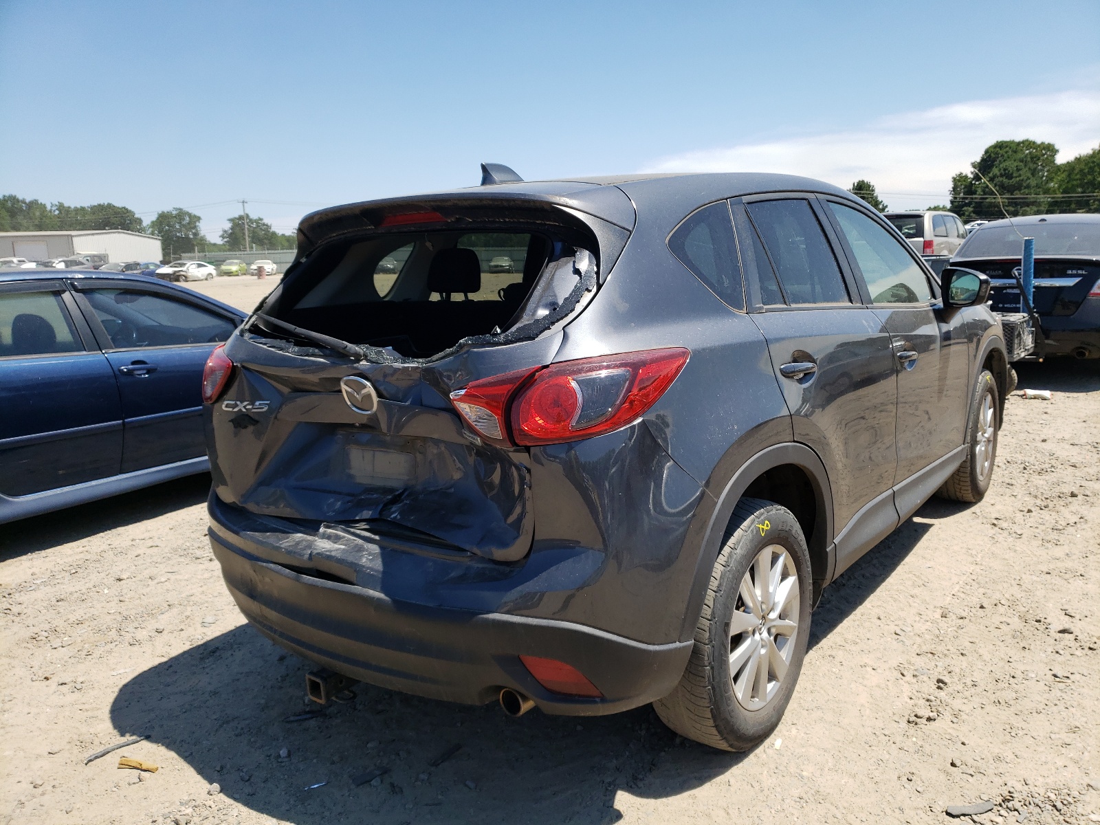 Photo 4 from auction – 2014 MAZDA CX-5 TOURI with VIN JM3KE2CY1E0411252