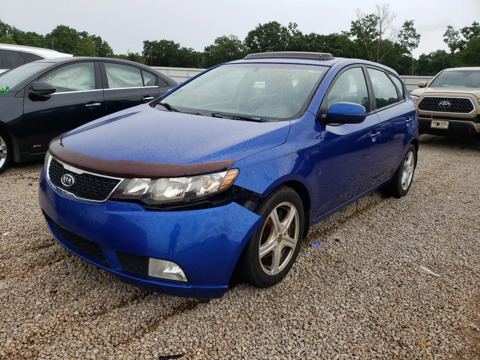 Photo 2 from auction – 2012 KIA FORTE SX with VIN KNAFW5A37C5522384