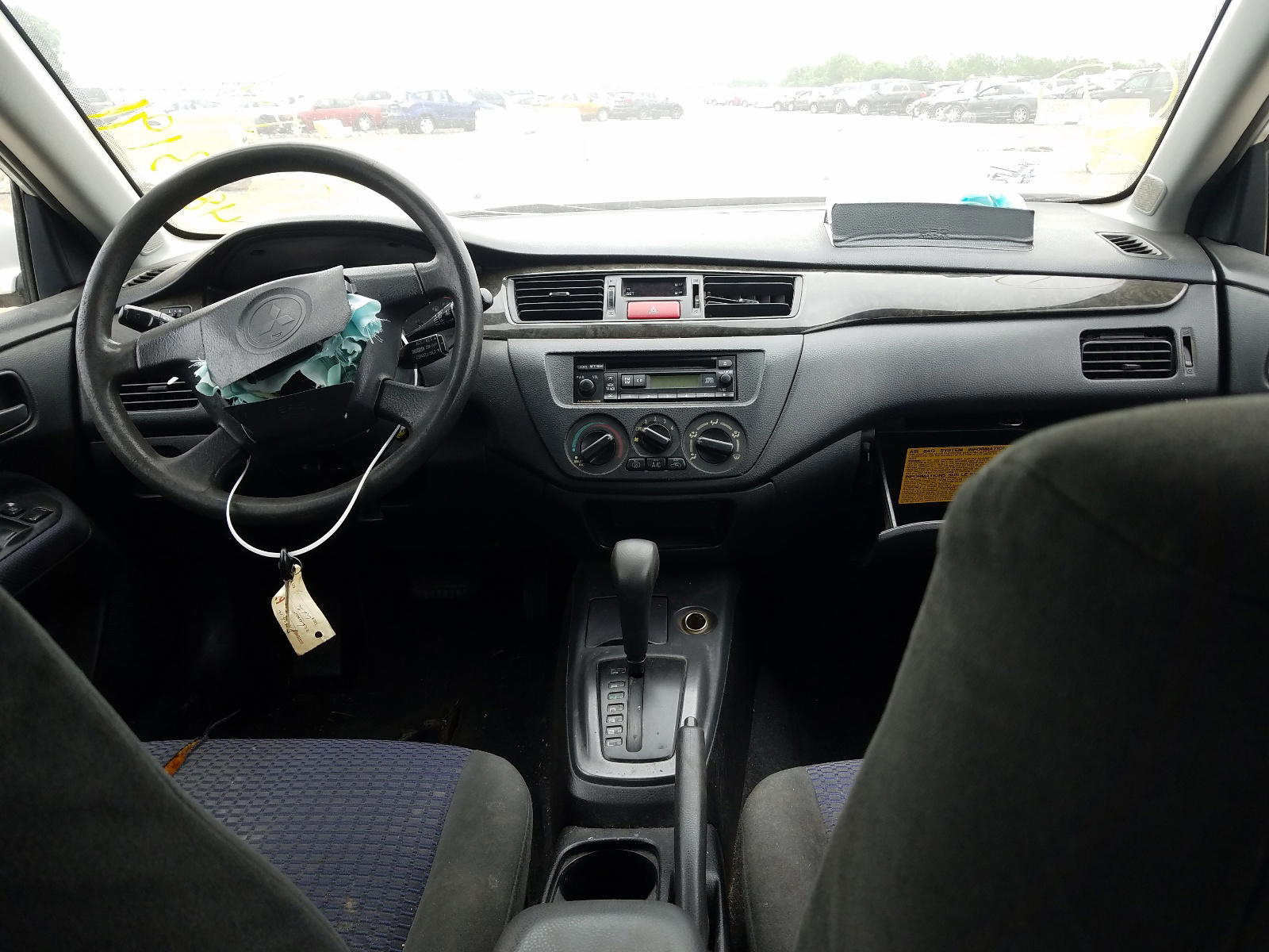 Photo 9 from auction – 2003 MITSUBISHI LANCER LS with VIN JA3AJ36E43U094966