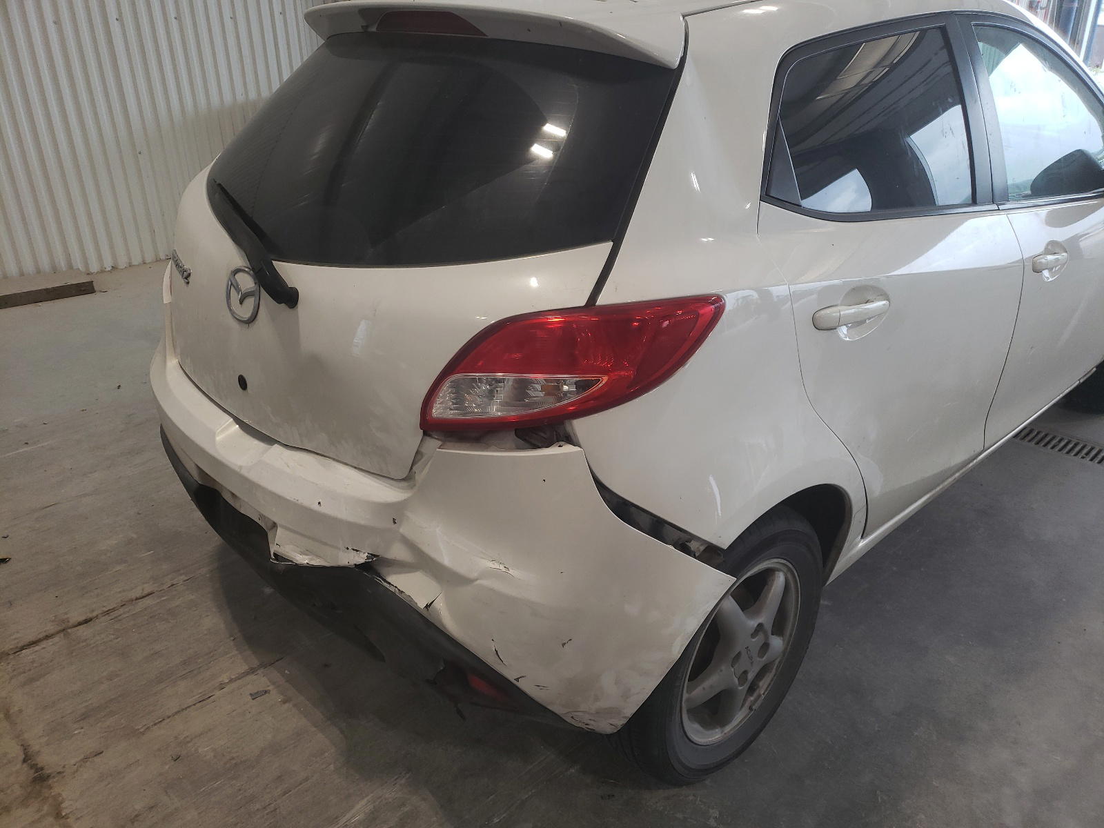 Photo 9 from auction – 2013 MAZDA 2 with VIN JM1DE1LY6D0166474