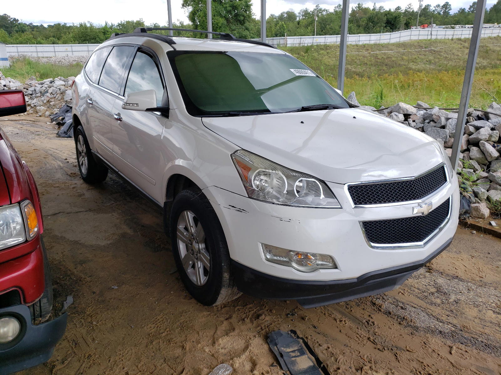 CHEVROLET TRAVERSE L 2012 with VIN 1GNKRGED0CJ250640 - Photo from auction