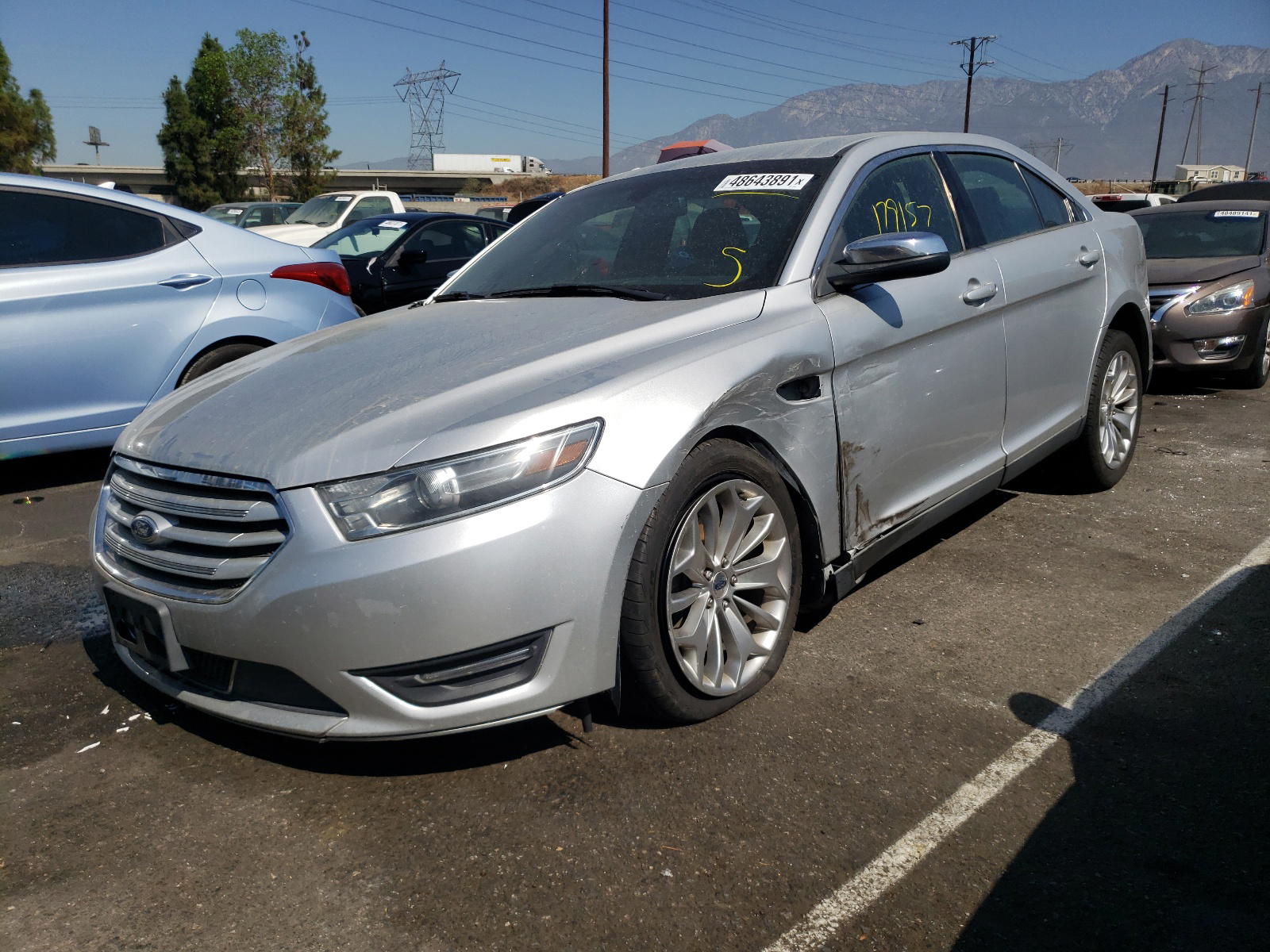 Photo 2 from auction – 2015 FORD TAURUS LIM with VIN 1FAHP2F86FG171056