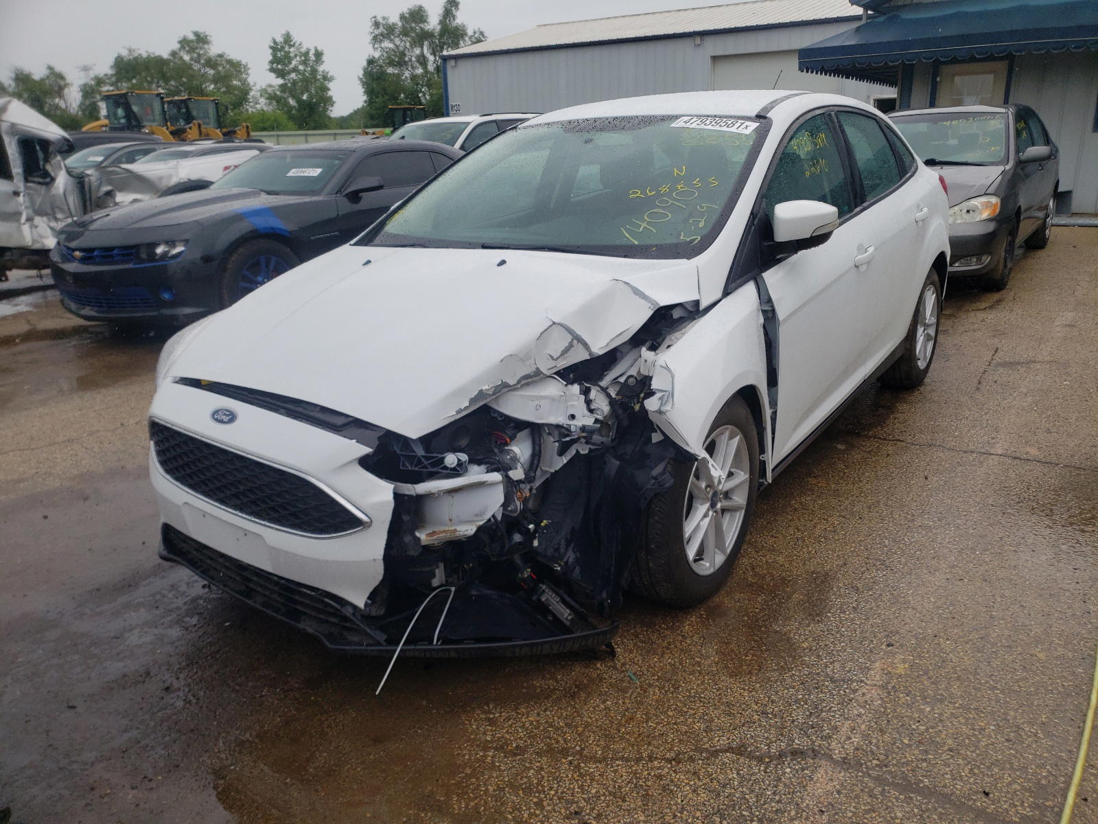 Photo 2 from auction – 2017 FORD FOCUS SE with VIN 1FADP3F23HL268855