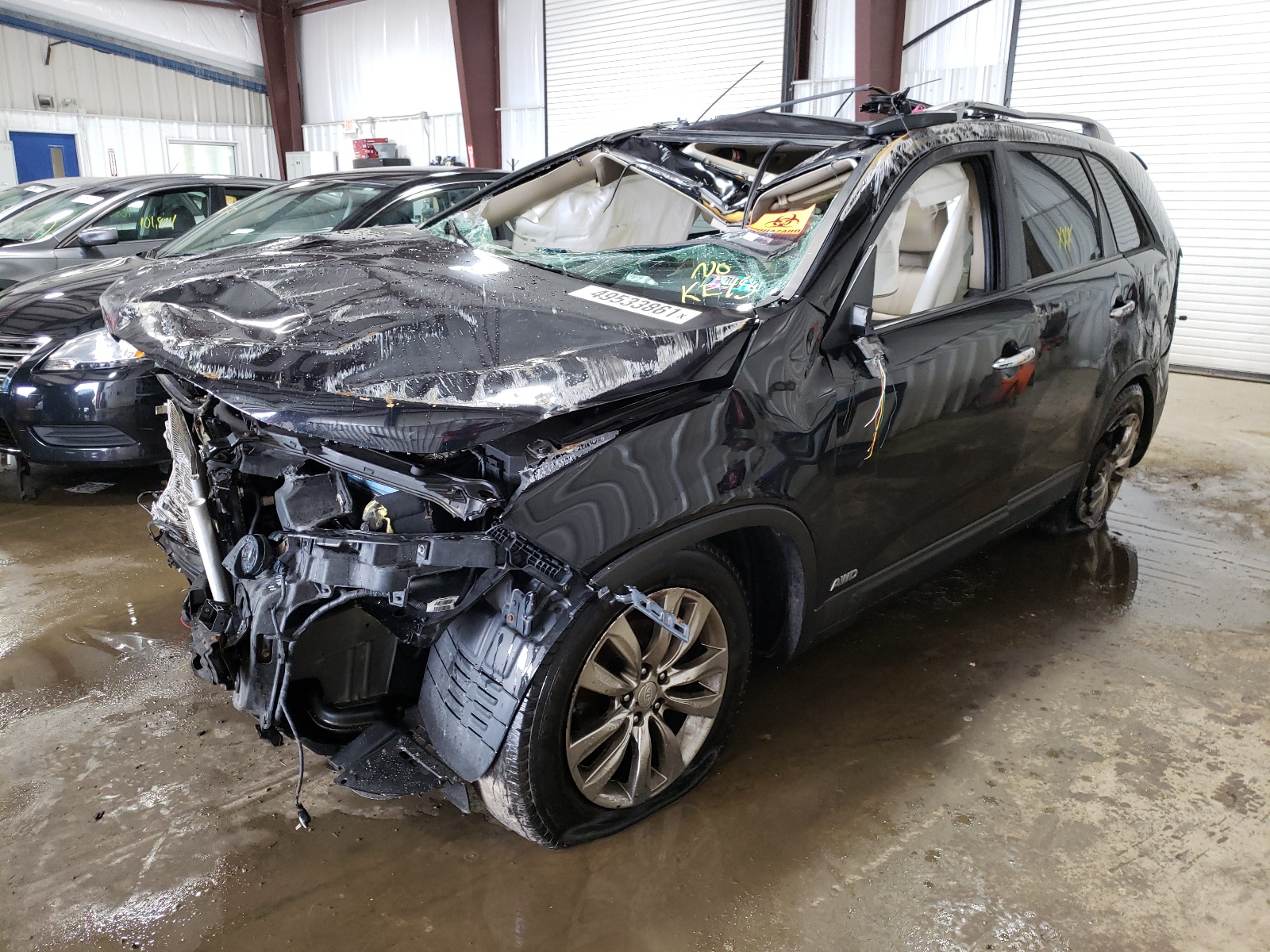 Photo 2 from auction – 2011 KIA SORENTO EX with VIN 5XYKUDA24BG090349