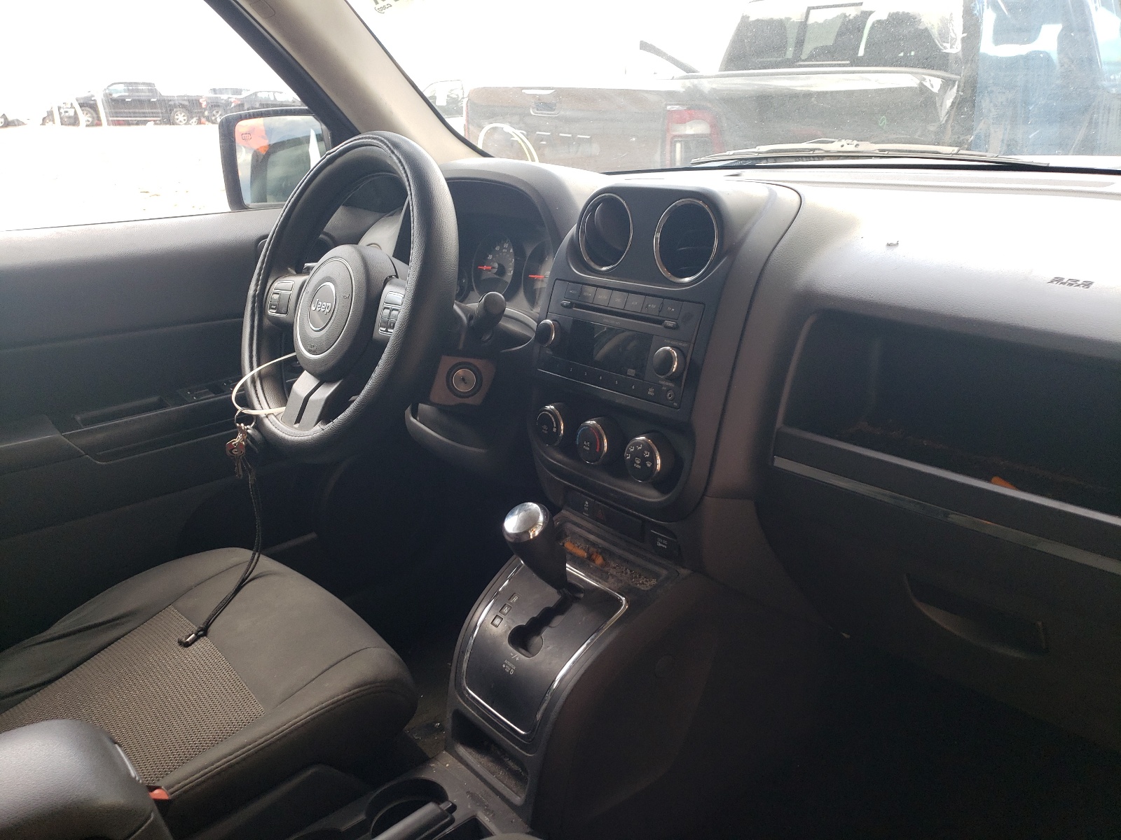 Photo 9 from auction – 2011 JEEP PATRIOT SP with VIN 1J4NT1GA1BD108201
