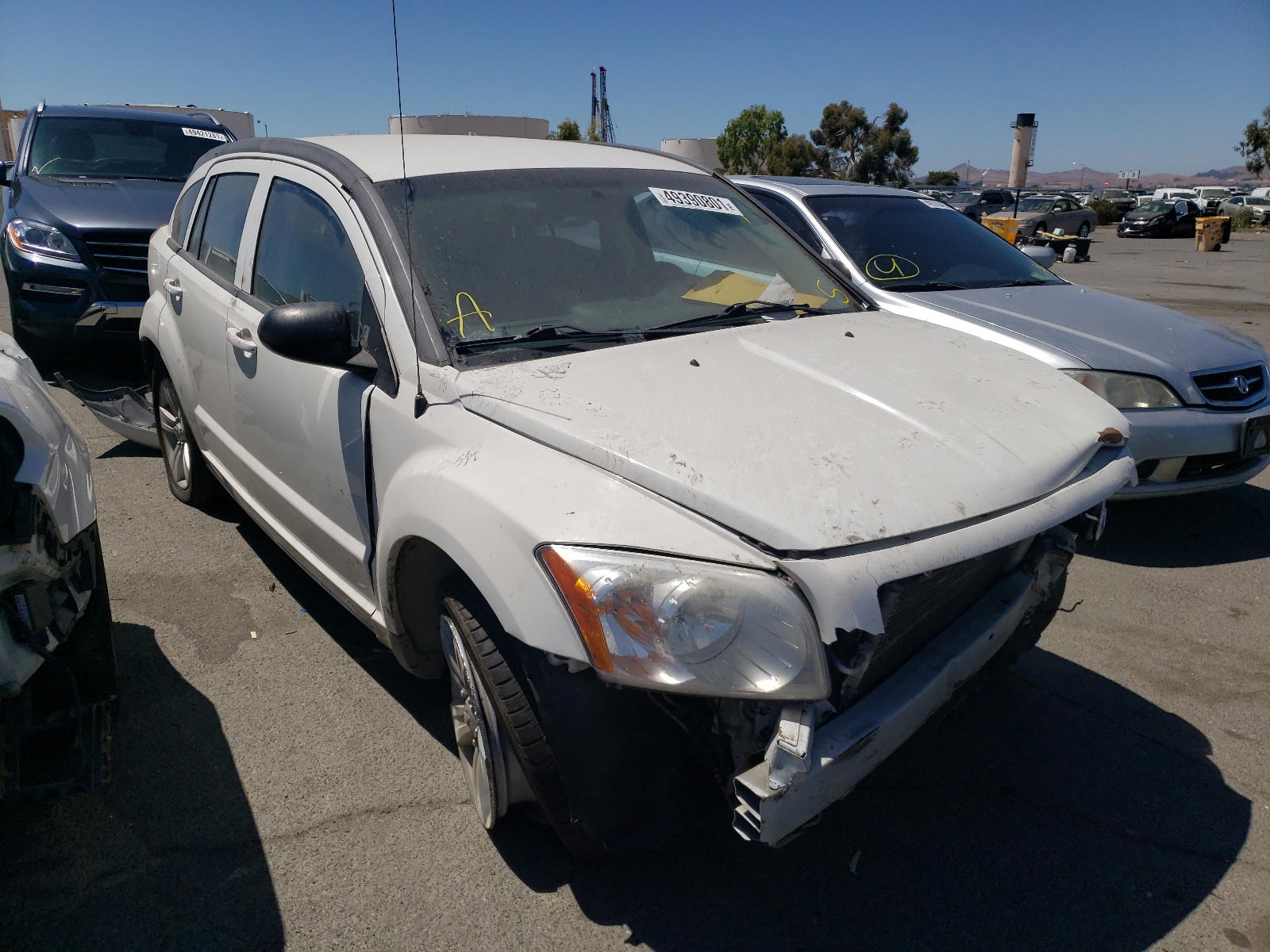 DODGE CALIBER 2010 with VIN 1B3CB4HA4AD586080 - Photo from auction