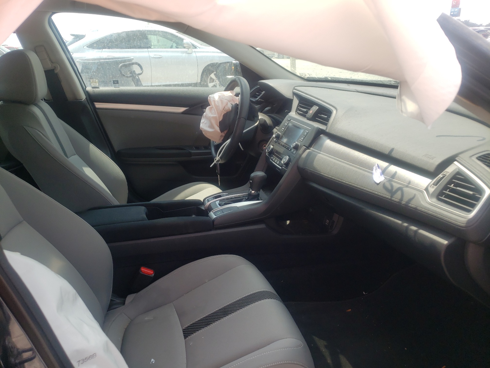 Photo 5 from auction – 2018 HONDA CIVIC LX with VIN 19XFC2F58JE007383