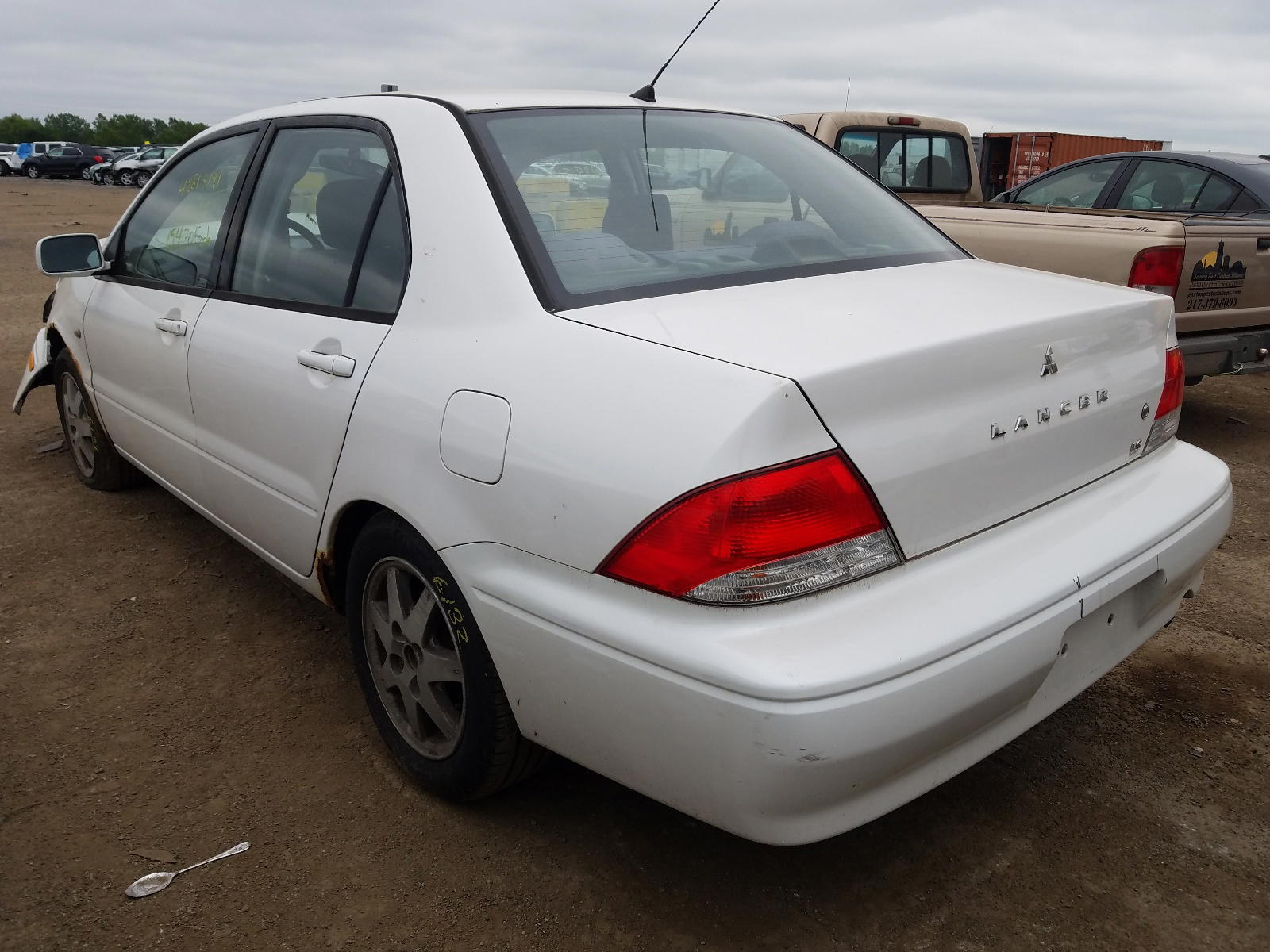 Photo 3 from auction – 2003 MITSUBISHI LANCER LS with VIN JA3AJ36E43U094966