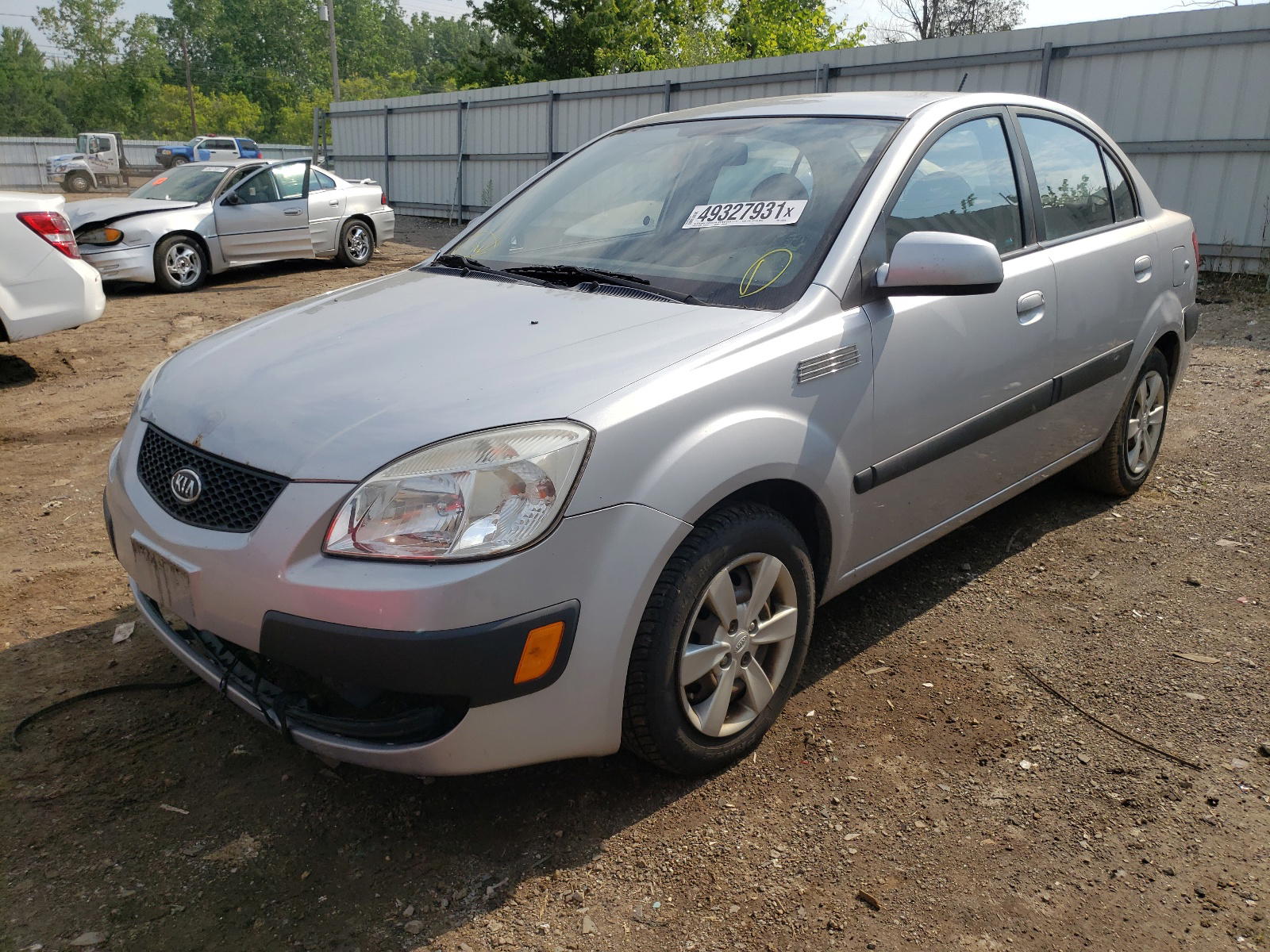 Photo 2 from auction – 2009 KIA RIO BASE with VIN KNADE223696518675